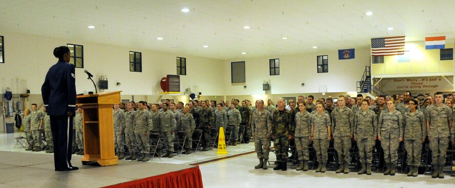 Staff Sgt. Felitia Rowe, United States Air Focre Band of Flight, sings the national anthem at the 178th Fighter Wing new mission celelbration May 14, 2010, Springfield, Ohio.
The 178 FW will remotely fly the MQ-1 Predator unmanned aircraft and analyze information for the National Air and Space Intelligence Center.
