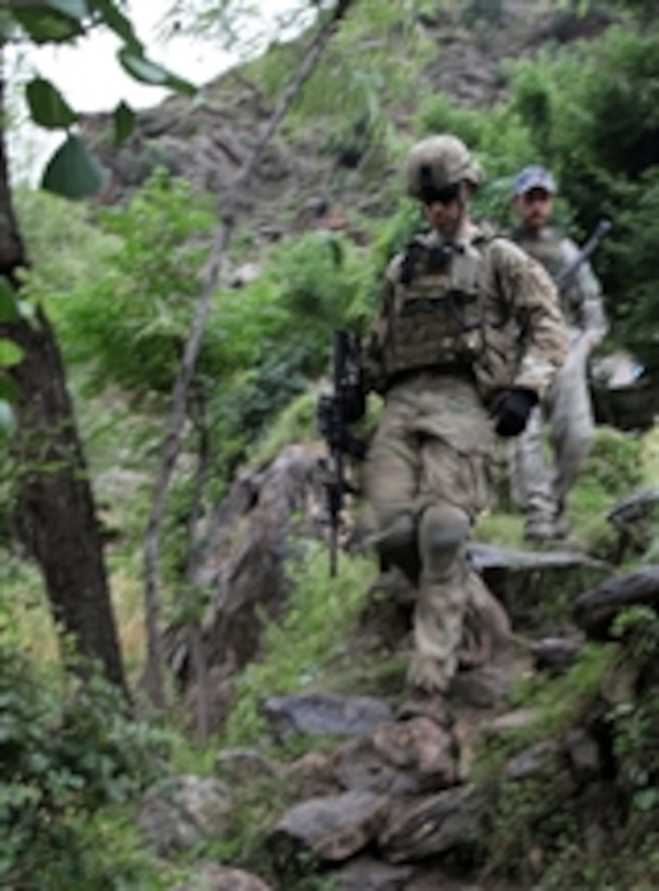 U.S. Army 1st Lt. Thomas Goodman, of Charlie Company, 2nd Battalion, 12th Infantry Regiment, Task Force Lethal Warrior, patrols through a local village in Sekret Valley, Afghanistan, on May 5, 2010.  