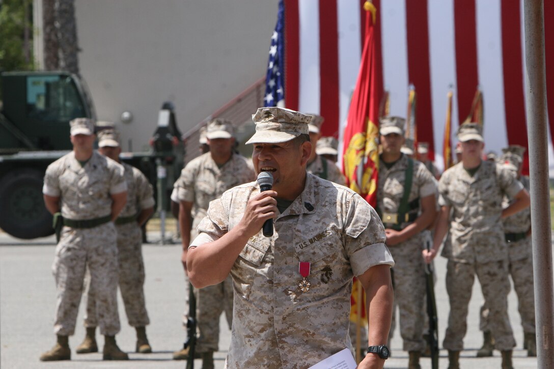 Sgt. Maj. Steven J. Lara, 48, from Coolidge, Ariz., former sergeant major of 1st Marine Logistics Group, speaks to friends, family members and fellow Marines and sailors who joined to honor and celebrate his retirement after 30 years of faithful service to the Marine Corps and United States during a cer¬emony here May 21.