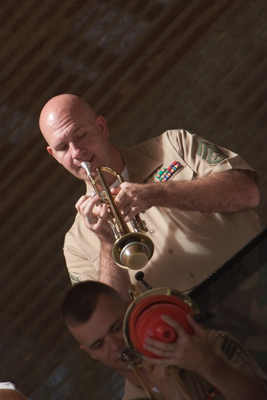 Staff Sgt. James W. Strube, a trumpeter with the U.S. Marine Corps Forces, Pacific, Band, performs at Kapiolani Park May 22 during Military Appreciation Day. The annual event, sponsored by USO Hawaii and the city and county of Honolulu, featured musical performances, free admission, food and drinks at the Honolulu Zoo and a parade.