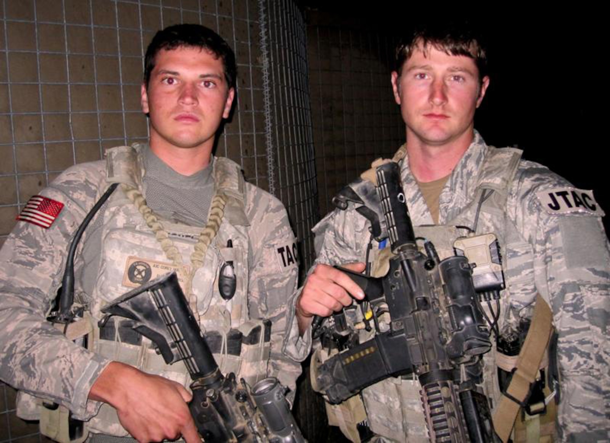 FOB ORGUN-E, Afghanistan-- (Left) Airman 1st Class Corey Hughes, a tactical air control party Airman, and Senior Airman Daniel Garner, a joint terminal attack control Airman, both assigned to the 817th Expeditionary Air Support Operations Squadron, stop for a picture after returning from a recent mission. Both Airmen are deployed from the 19th ASOS, Ft. Campbell, Ky. (Courtesy Photo)