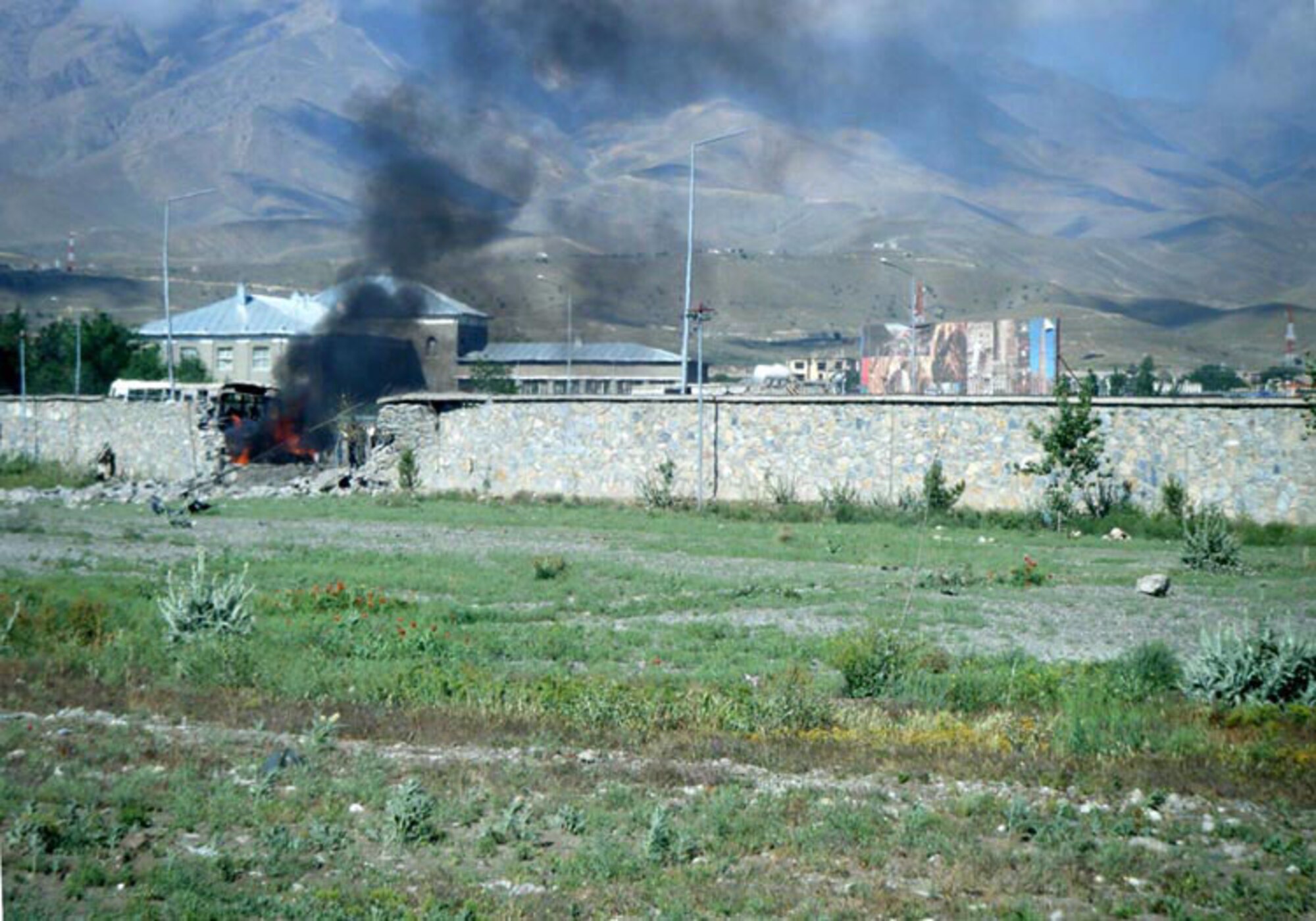 After landing his Mi-17 helicopter in a near by field, Lt. Col. Holm and crew rescued three American soldiers after their convoy had been attacked by a vehicle borne IED on May 18, 2010.