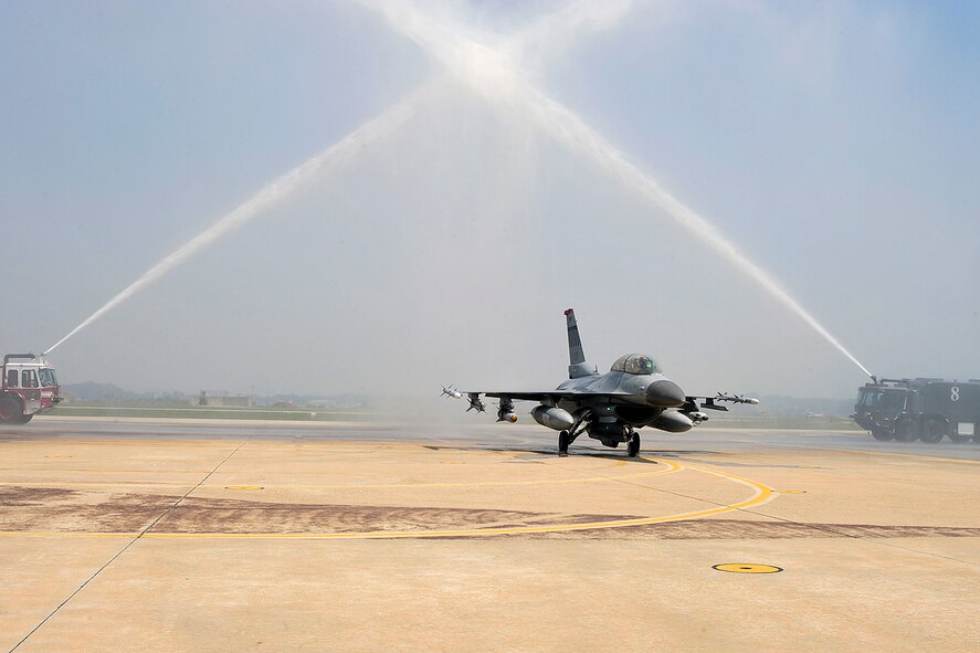 Col. Mark Mattison, 51st Fighter Wing vice commander, taxis his aircraft during his "fini-flight" celebration at Osan Air Base, Republic of Korea, May 21. He has served as the wing's vice commander since June 2008. Colonel Mattison and his family are heading to Ramstein AB, Germany, where he will serve as Headquarters U.S. Air Forces in Europe director of staff. (U.S. Air Force photo/Staff Sgt. Eunique Stevens)
