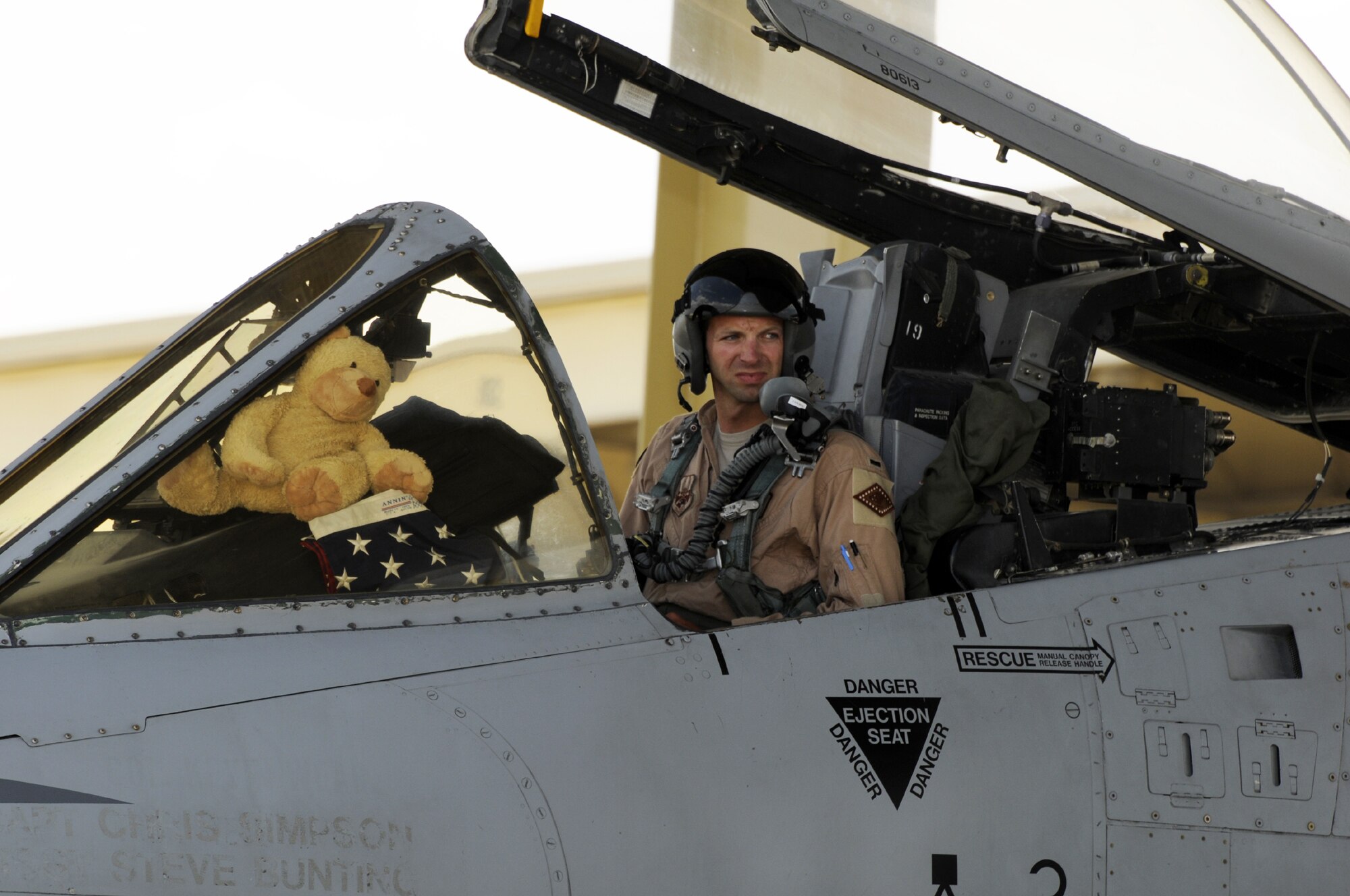 First Lt. Wade Hendrickson, an A-10C Thunderbolt II "Warthog" pilot with the Arkansas Air National Guard's 188th Fighter Wing awaits the aircraft shutdown signal from his crew chief May 22 at the 188th. The 188th just returned ten A-10s and ten pilots from an Aerospace Expeditionary Force (AEF) deployment to Kandahar Airfield in Afghanistan. (U.S. Air Force photo by Technical Sgt. Stephen Hornsey/188th Fighter Wing Public Affairs)