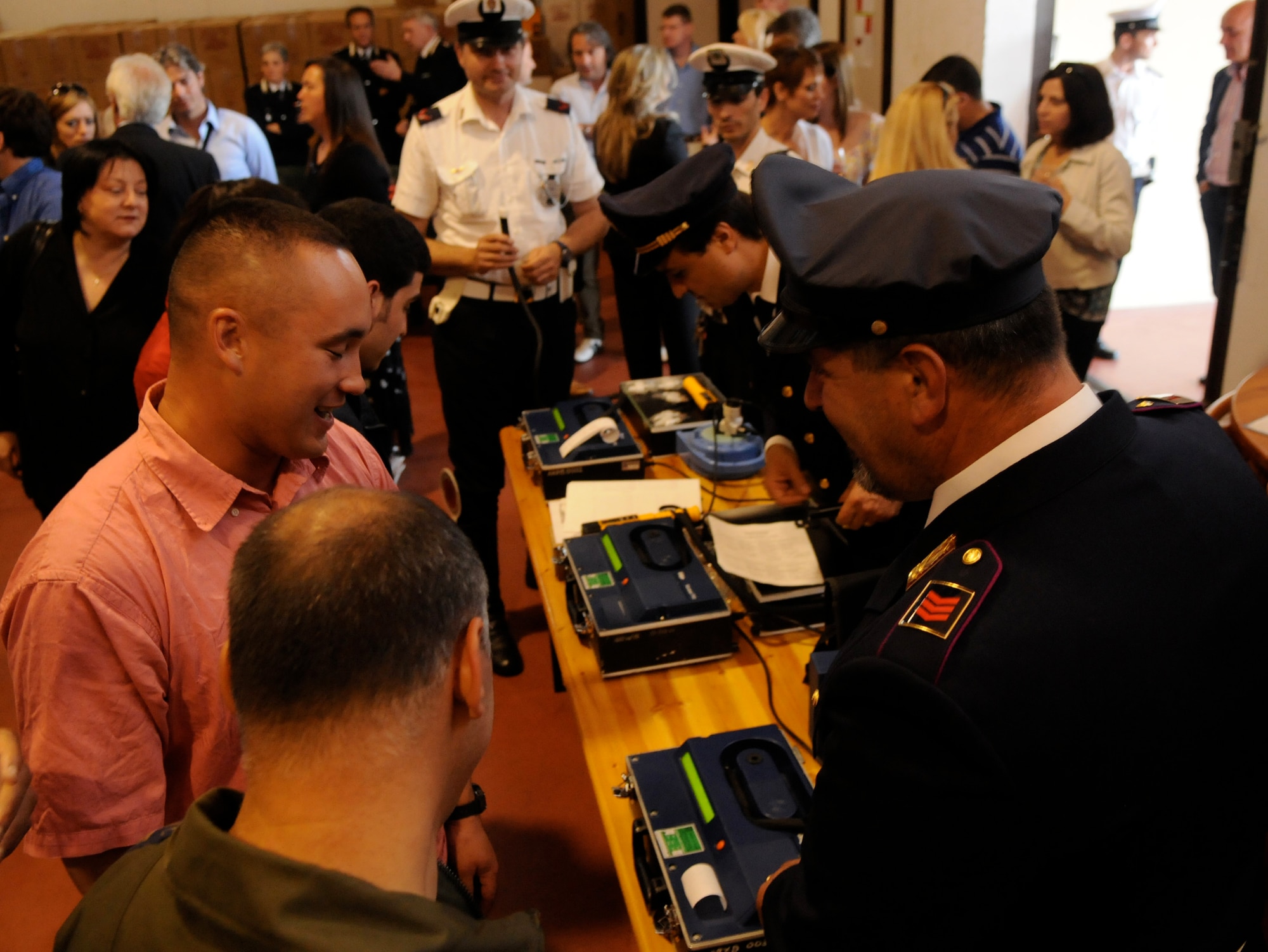 Airmen take a breathalyzer test May 21 at the Gelisi vineyard. More than 30 young Airmen participated in an evening of free wine, food and round-trip transportation to an Italian vineyard to help them fully understand the affects alcohol can have on each individual. (U.S. Air Force photo/Staff Sgt. Justin Weaver)
