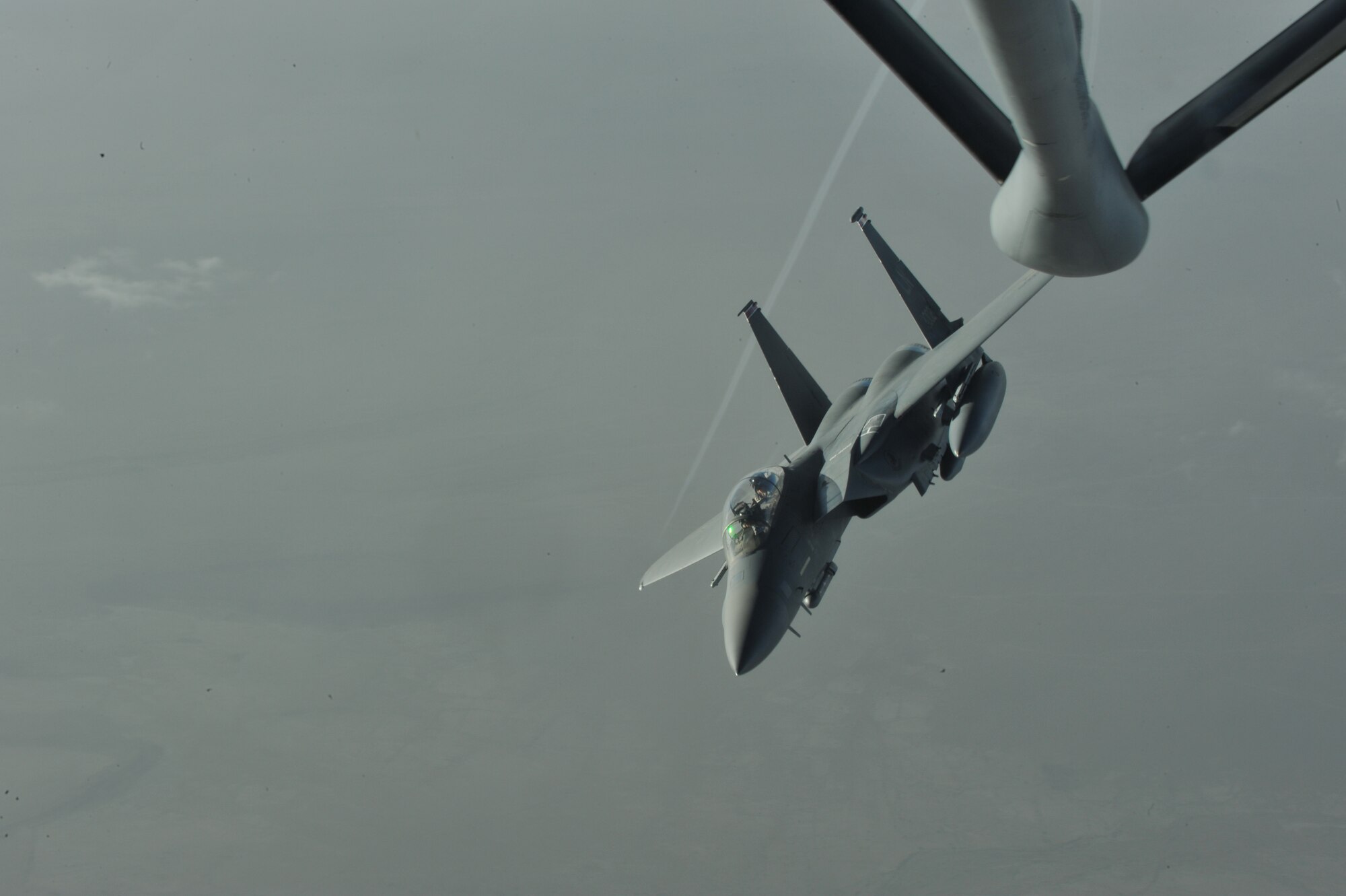 An F-15E Strike Eagle disconnects from the boom of a KC-135 Stratotanker over Afghanistan after being refueled April 30, 2010.  (U.S. Air Force photo/Staff Sgt. Quinton Russ/released)