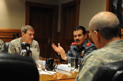 Gen. Stephen Lorenz (left), Air Education and Training Command commander, listens intently to Maj. Gen. Mohammad Dawran, Afghan National Army Air Corps commander, during briefings at AETC Headquarters. (U.S. Air Force photo by Rich McFadden)