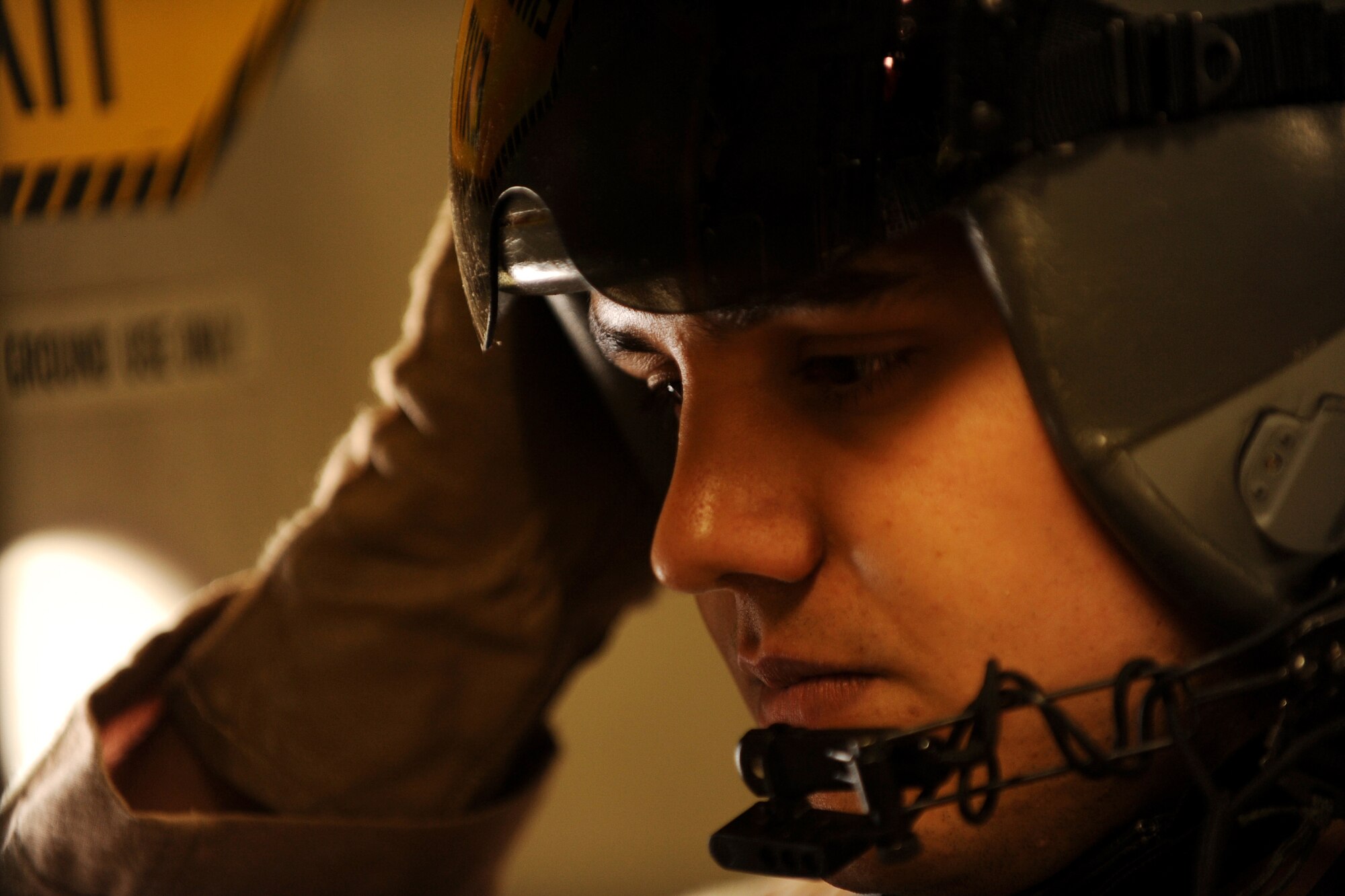 Senior Airman Brandon Ybarra, a C-17 Globemaster III loadmaster assigned to the 816th Expeditionary Airlift Squadron, waits to start the ramp-opening checklist of C-17 aircraft prior to arriving over a drop zone in Afghanistan, May 9, 2010. (U.S. Air Force photo/Staff Sgt. Manuel J. Martinez, released)