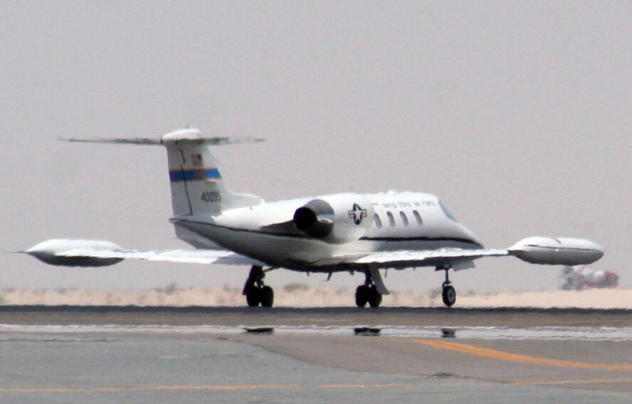 A C-21 passenger jet taxis on the runway to the flightline of the 380th Air Expeditionary Wing at a non-disclosed location in Southwest Asia on May 19, 2010.  The C-21, according to its Air Force fact sheet, is a twin turbofan engine aircraft used for cargo and passenger airlift. The aircraft is the military version of the Lear Jet 35A business jet. In addition to providing cargo and passenger airlift, the aircraft is capable of transporting one litter or five ambulatory patients during aeromedical evacuations. The C-21 can carry eight passengers and 42 cubic feet (1.26 cubic meters) of cargo. (U.S. Air Force Photo/Master Sgt. Scott T. Sturkol/Released)