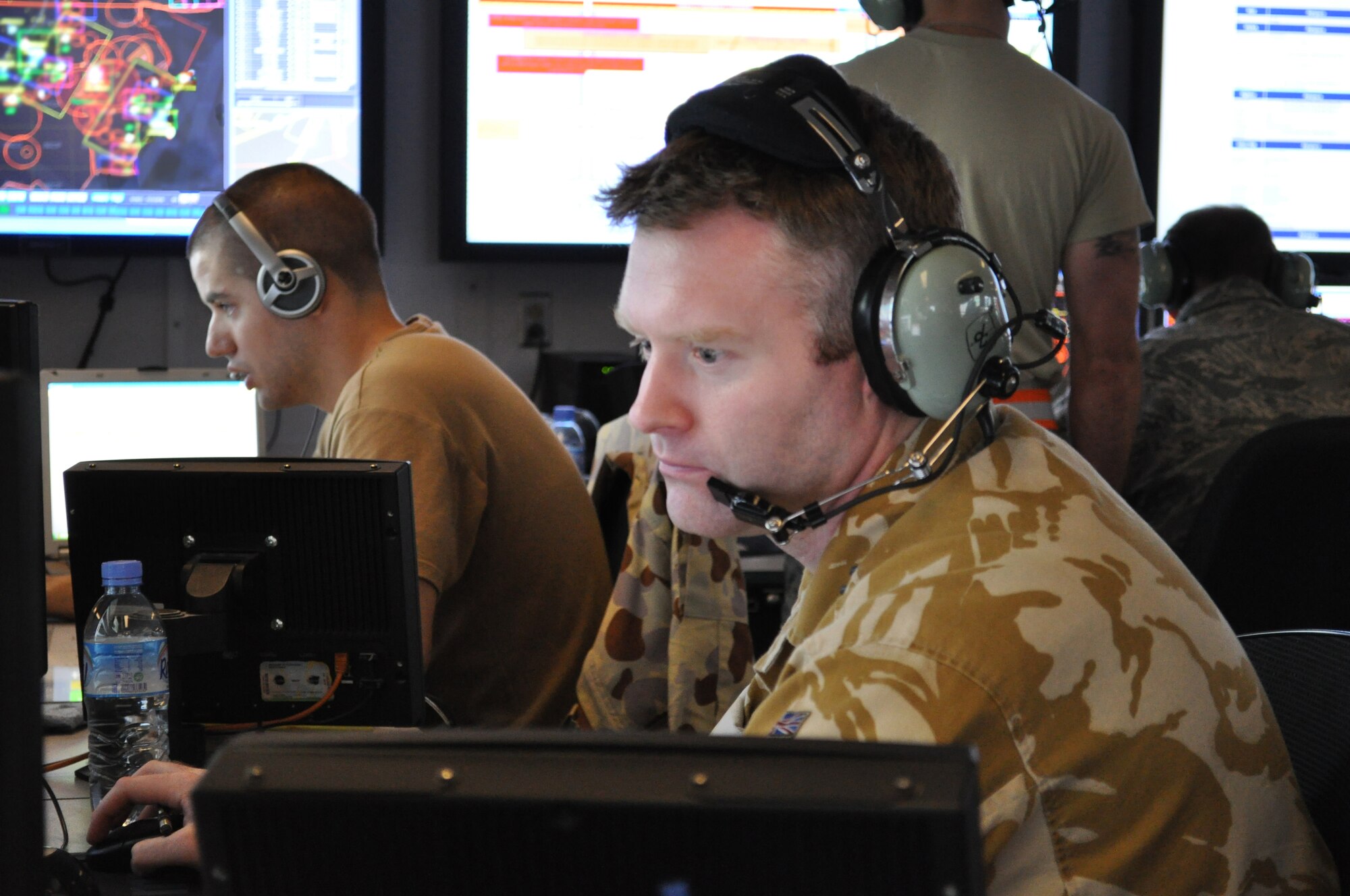 Royal Air Force Sergeant Mark Roberts, 71st Expeditionary Air Control Squadron U.K. Aerospace and Control Systems weapons controller, directs aircraft in the U.S. Central Command area of the responsibility at a non-disclosed Southwest Asia location, April 19, 2010. Sergeant Roberts is deployed as part of a six-man team of British Airmen embedded with the 71 EACS. (U.K. Royal Air Force photo/Pilot Officer James Payne) 