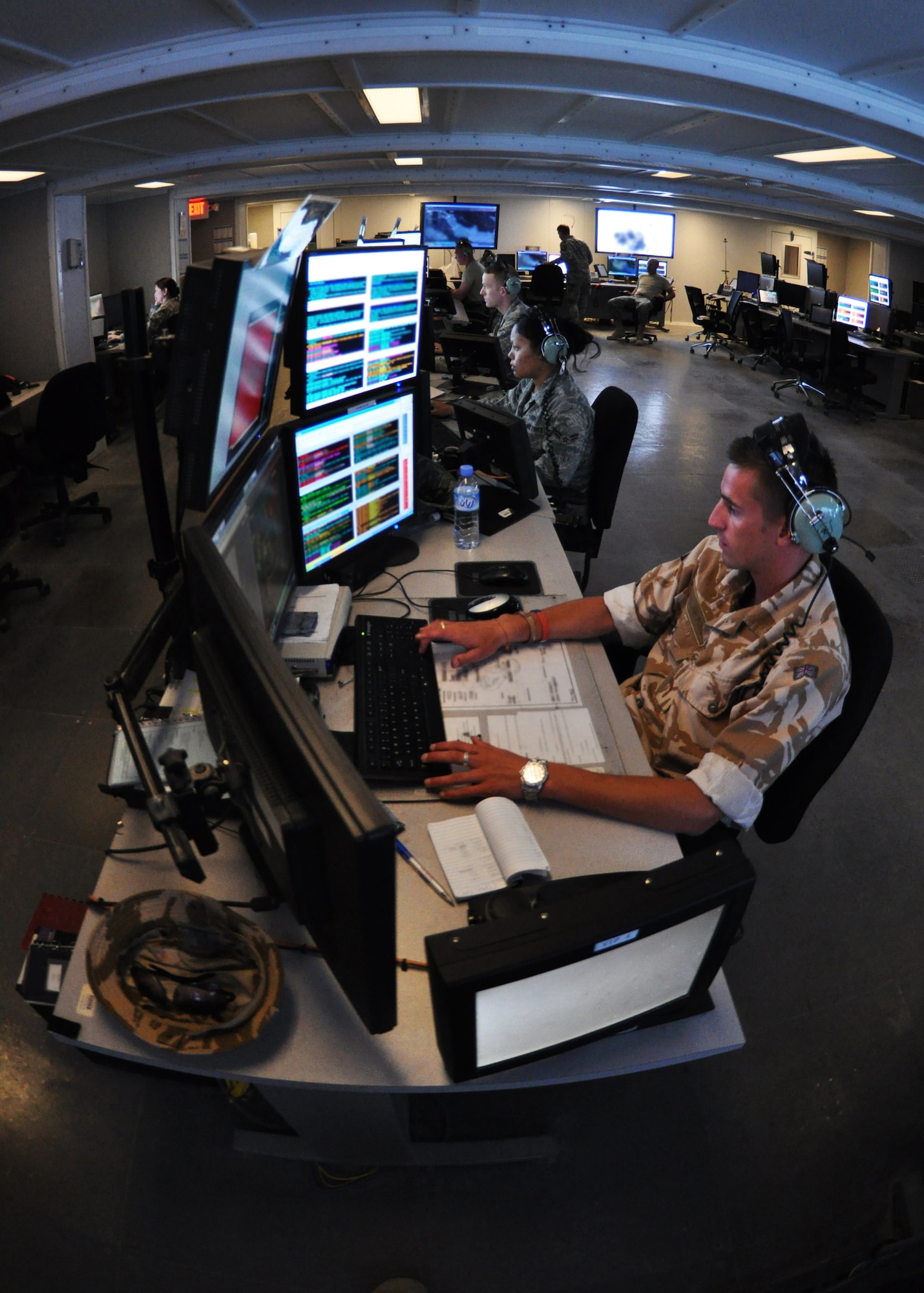 Royal Air Force Senior Air Craftsman Marc Clowes, 71st Expeditionary Air Control Squadron U.K. Aerospace and Control Systems surveillance technician, confirms the air picture is correct, ensuring aircraft don't fly into unsafe locations, at a non-disclosed Southwest Asia location, April 19, 2010. (U.K. Royal Air Force photo/Pilot Officer James Payne) 