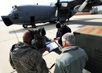 Maintainers with the 919th Special Operations Wing look over the maintenance logbook May 5 at Gowen Field, Idaho.  919th maintainers were sent to Gowen Field to prepare four Talons to take off for one more mission – a flight into retirement and decommissioning.  Three of the Talons flew to Davis-Monthan Air Force Base, Ariz.  The other went to Hurlburt Field, Fla., to be placed in the Air Force Special Operations Command airpark.  (U.S. Air Force photo/Tech. Sgt. Samuel King Jr.)