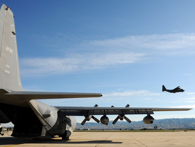 MC-130 Combat Talon #572 lifts off on its final flight mission as Talon #567 waits to go, May 7 at Gowen Field, Idaho.  919th maintainers were sent to Gowen Field to prepare four Talons to take off for one more mission – a flight into retirement and decommissioning.  Three of the Talons flew to Davis-Monthan Air Force Base, Ariz.  The other went to Hurlburt Field, Fla., to be placed in the Air Force Special Operations Command airpark.  (U.S. Air Force photo/Tech. Sgt. Samuel King Jr.)  