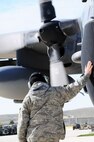 Senior Master Sgt. Bill McAnelly, 919th Maintenance Group, watches as Engine 3 fires up for the last time on MC-130E Combat Talon #567 May 7 at Gowen Field, Idaho.  919th maintainers were sent to Gowen Field to prepare four Talons to take off for one more mission – a flight into retirement and decommissioning.  Three of the Talons flew to Davis-Monthan Air Force Base, Ariz.  The other went to Hurlburt Field, Fla., to be placed in the Air Force Special Operations Command airpark.  (U.S. Air Force photo/Tech. Sgt. Samuel King Jr.)