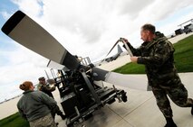 Maintainers with the 124th Fighter Wing begin moving aircraft parts out of the shop prior to the exit of the last of the C-130s at Gowen Field, Idaho.  919th Special Operations Wing maintainers from Duke Field, Fla., were sent to Boise, Idaho, to prepare four Talons to take off for one more mission – a flight into retirement and decommissioning.  Three of the Talons flew to Davis-Monthan Air Force Base, Ariz.  The other went to Hurlburt Field, Fla., to be placed in the Air Force Special Operations Command airpark.  (U.S. Air Force photo/Tech. Sgt. Samuel King Jr.)  
