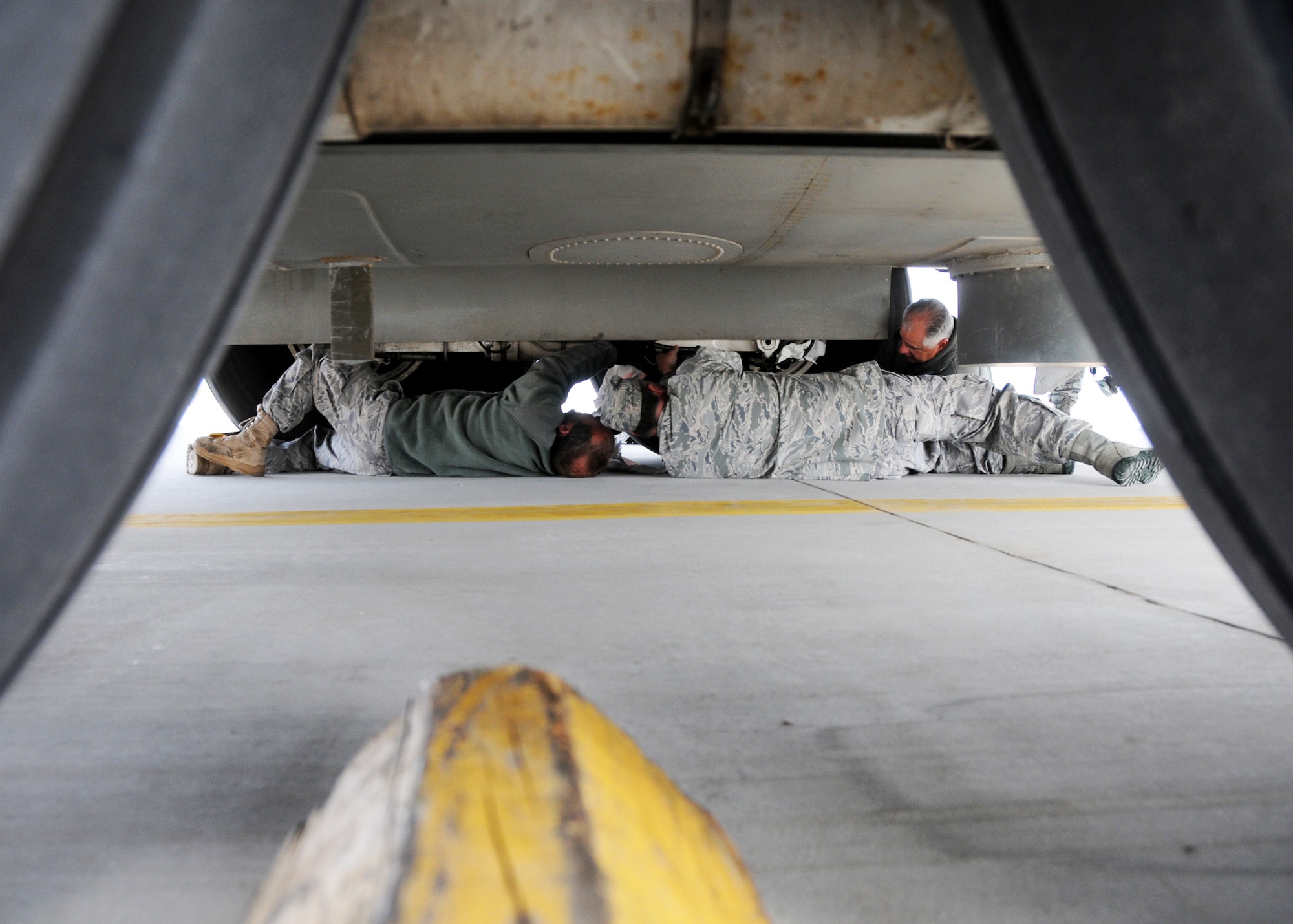Maintainers from the 919th Special Operations Wing work on a hydraulic leak on MC-130E Combat Talon #555 prior to its final flight May 5 from Gowen Field, Idaho.  919th maintainers were sent to Boise, Idaho, to prepare four Talons to take off for one more mission – a flight into retirement and decommissioning.  Three of the Talons flew to Davis-Monthan Air Force Base, Ariz.  The other went to Hurlburt Field, Fla., to be placed in the Air Force Special Operations Command airpark.  (U.S. Air Force photo/Tech. Sgt. Samuel King Jr.) 