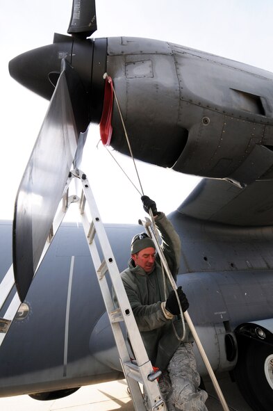 Master Sgt. Kevin Sterzing, 919th Maintenance Group, ties down an intake plug on an MC-130E Combat Talon May 7 at Gowen Field, Idaho.  919th maintainers were sent to Boise, Idaho, to prepare four Talons to take off for one more mission – a flight into retirement and decommissioning.  Three of the Talons flew to Davis-Monthan Air Force Base, Ariz.  The other went to Hurlburt Field, Fla., to be placed in the Air Force Special Operations Command airpark.  (U.S. Air Force photo/Tech. Sgt. Samuel King Jr.)  