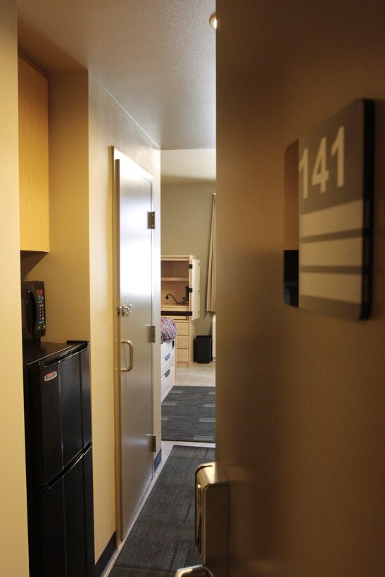 The rooms inside building 1432, the new barracks for 3rd Battalion, 11th Marine Regiment, have walk-in closet, refrigerator, microwave and personal bathroom. The rooms also feature plenty of open space for Marines to move around.