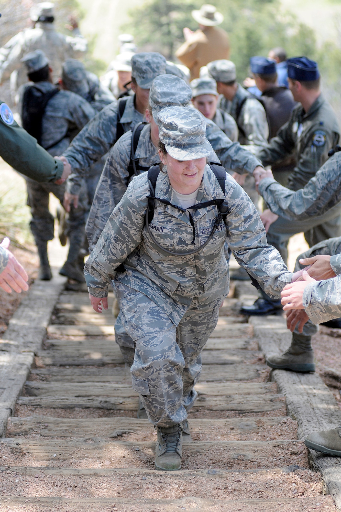 Cadet Candidate Julianne Germain ascends the "stairway to heaven" during the final phase of U.S. Air Force Academy Preparatory School training May 15, 2010, at the Academy, Colo. Nearly 200 cadet candidates graduated from the prep school in a ceremony May 18, 2010, and nearly 190 received appointments to the Academy. (U.S. Air Force photo/J. Rachel Spencer)