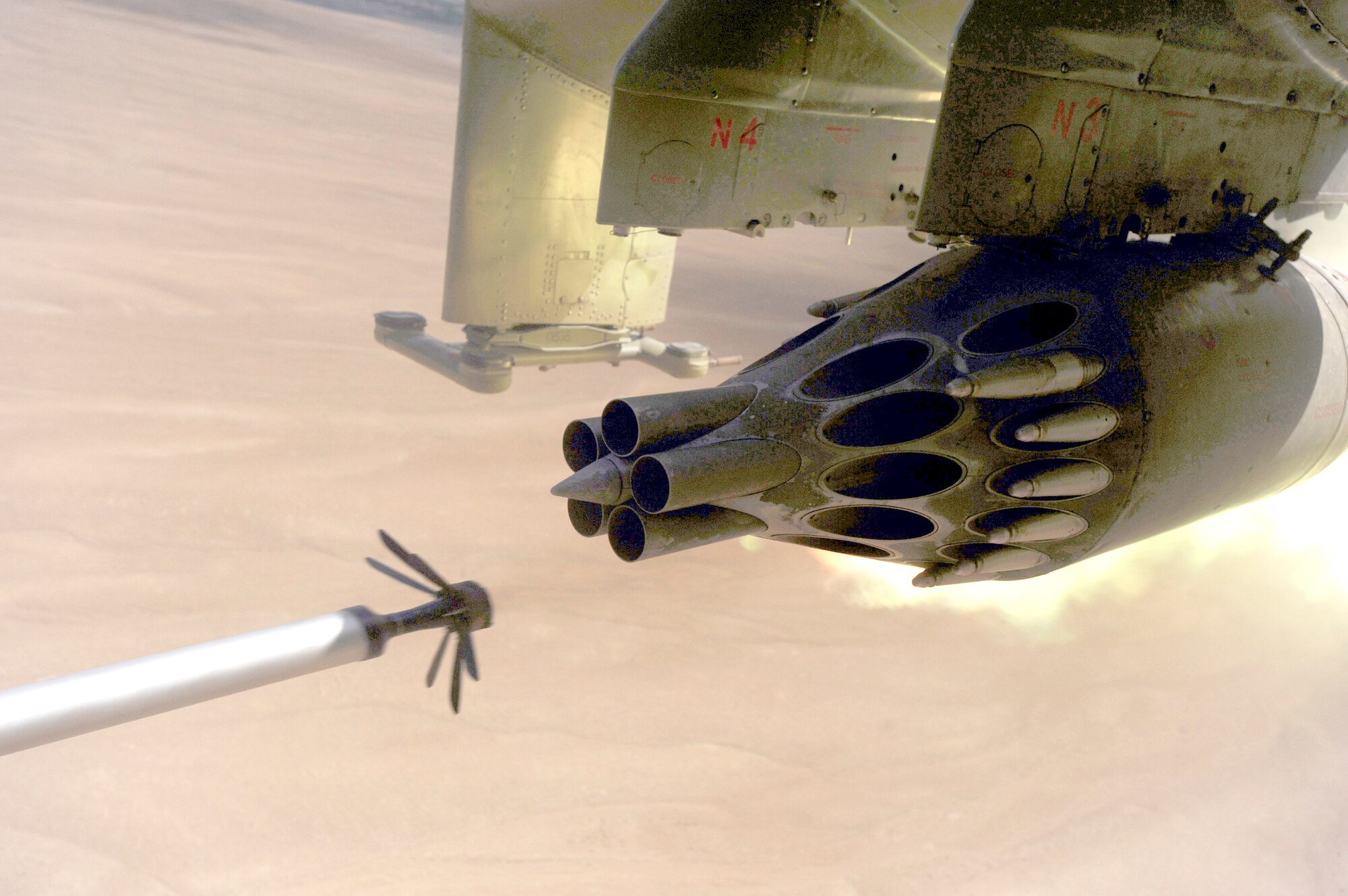 A KP long-guided rocket leaves its launcher mounted on an Afghan National Army Air Corps MI-35 helicopter on a live-fire training mission May 11, 2010, over Afghanistan. (U.S. Air Force photo/ Staff Sgt. Manuel J. Martinez)