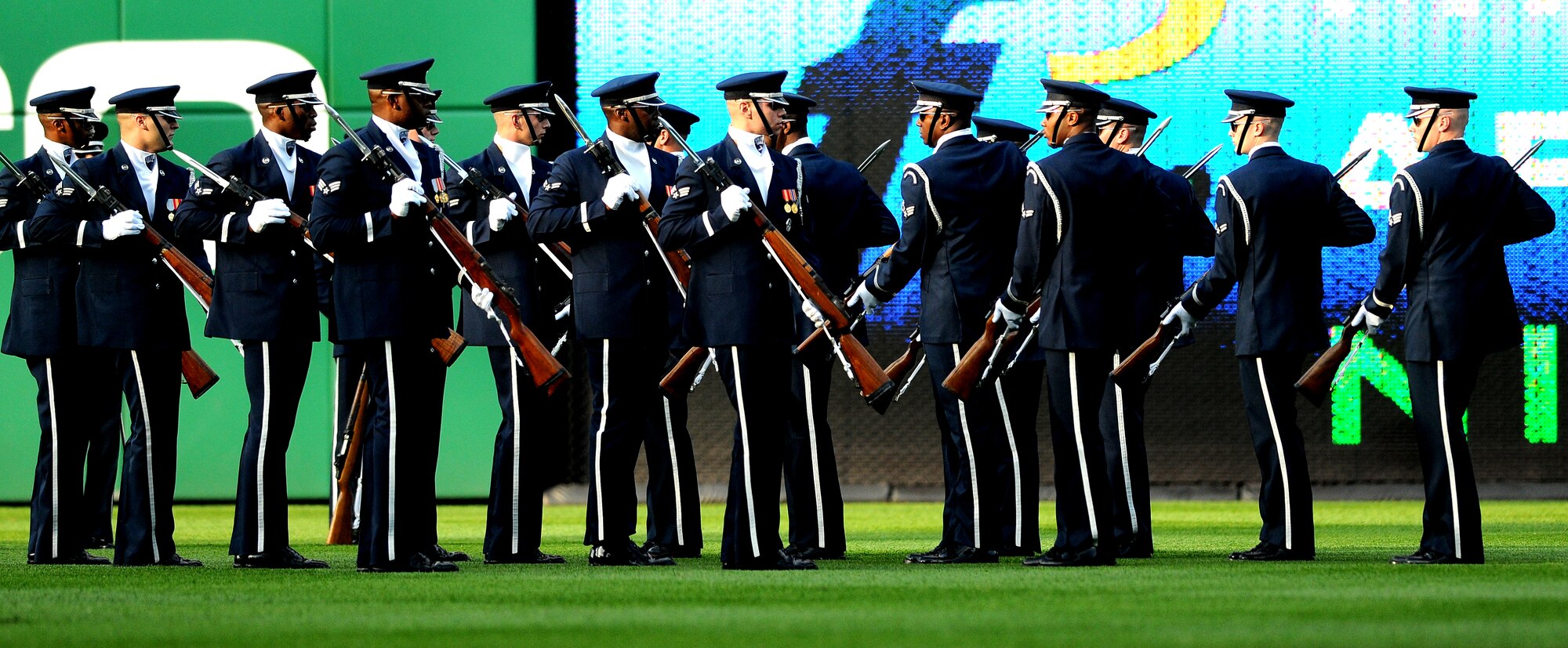 Members of the United States Air Force Honor Guard Drill Team perform at Nationals Stadium during Military Appreciation Night May 20.  Team Bolling members attended the game to represent their service, and support the Drill Team and Col. Cedric George, 11th Wing commander, during his throwing of the ceremonial first pitch. (U.S. Air Force photo by Airman 1st Class Katherine Windish)