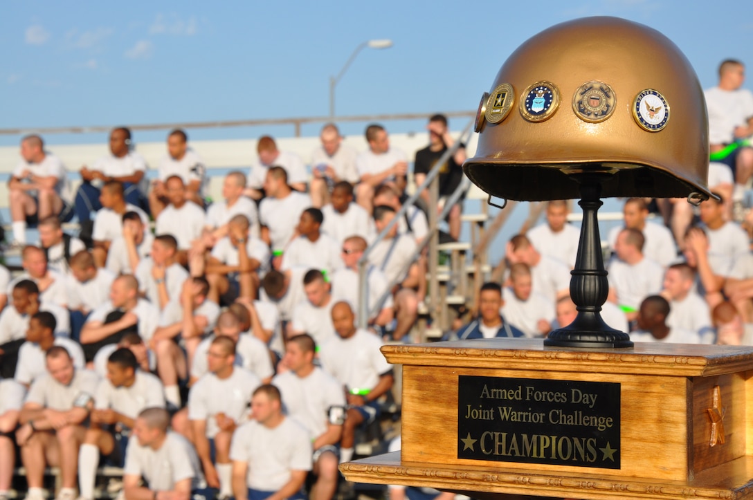 The Armed Forces Day Joint Warrior Challenge trophy is the prize that goes to the team that accumulates the most points after a day of physical events at the one mile track May 22, 2010.  Joint Warrior Challenge was a physical competition consisting of an armor-plated relay race, a litter-carry race, a tire flipping race and a tug of war.  (U.S. Air Force photo/Airman 1st Class Adawn Kelsey)