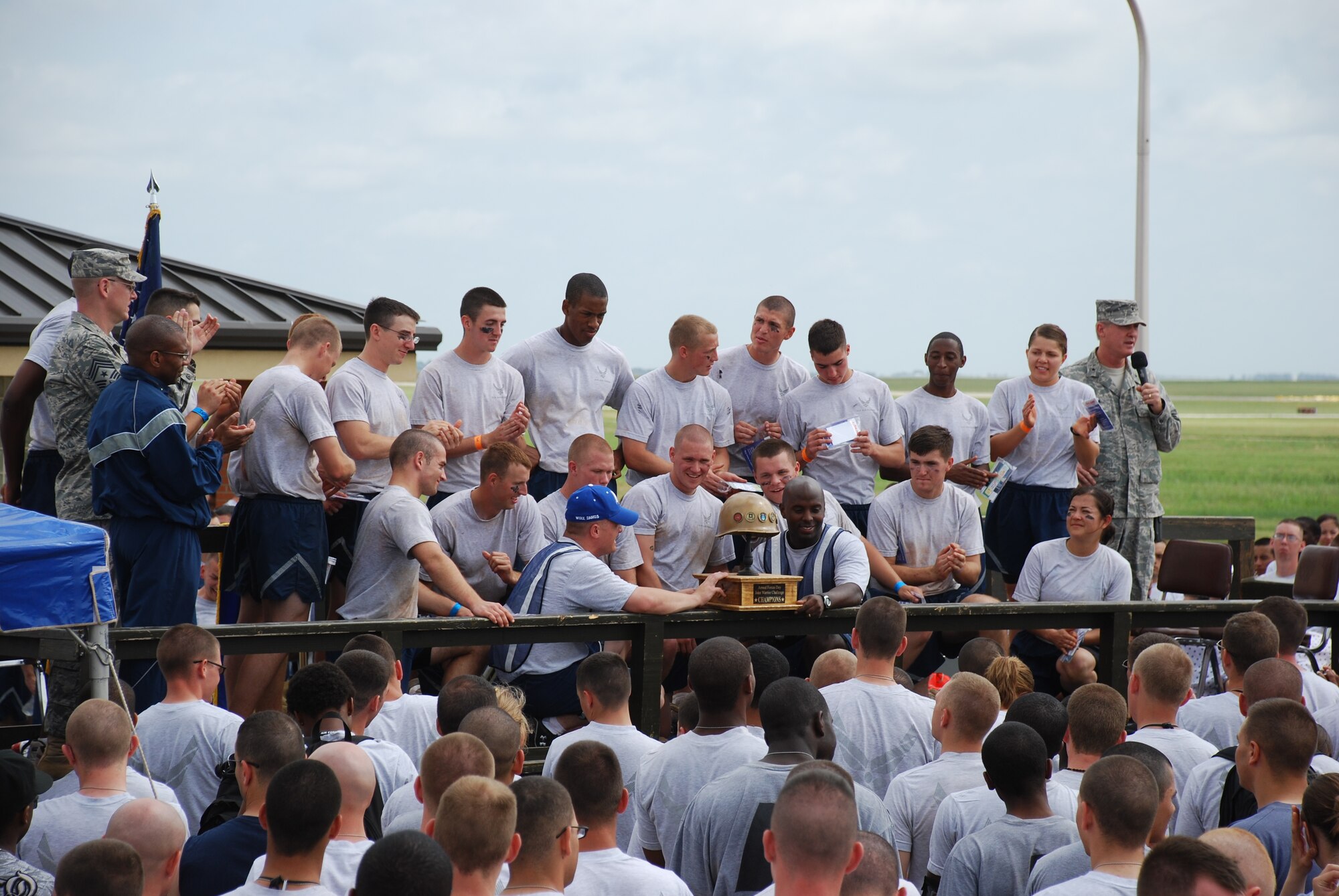 The 365th Training Squadron teams A and B display their championship trophy for winning the Joint Warrior Challenge at the one mile track May 22, 2010.  The 365th TRS teams A and B were tied for most points earned and were declared co-champions.  (U.S. Air Force photo/Tech. Sgt. Vernon Cunningham)
