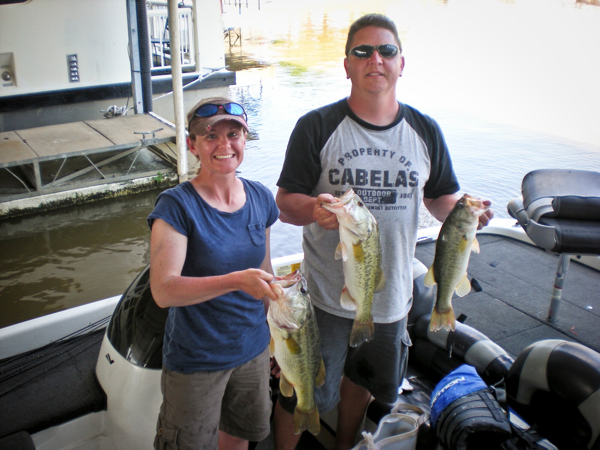 EUFAULA, Ala. -- Master Sgt. Danny Christ, 5th Bomb Wing staff and 5th Medical Group first sergeant, and his wife Staff Sgt. Virginia Christ, 5th Security Forces Squadron security controller, pose with a day’s catch during the 20th Annual Military Bass Angler Team Tournament held at the Lake Point Marina on Lake Eufaula near Eufaula, Ala., May 2 to May 7. The annual military tournament hosted a record setting 159 teams consisting of members from all active duty components from all across the country. (Courtesy photo)