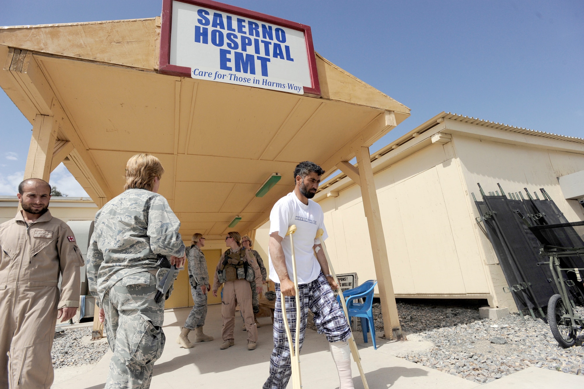 An Afghan man is taken to an ambulance for transportation on an Mi-17 helicopter to be medically evacuated May 12, 2010, at Forward Operating Base Salerno, Afghanistan. On average, the Salerno Hospital staff treats five to seven patients daily. (U.S. Air Force photo/Staff Sgt. Manuel J. Martinez) 
