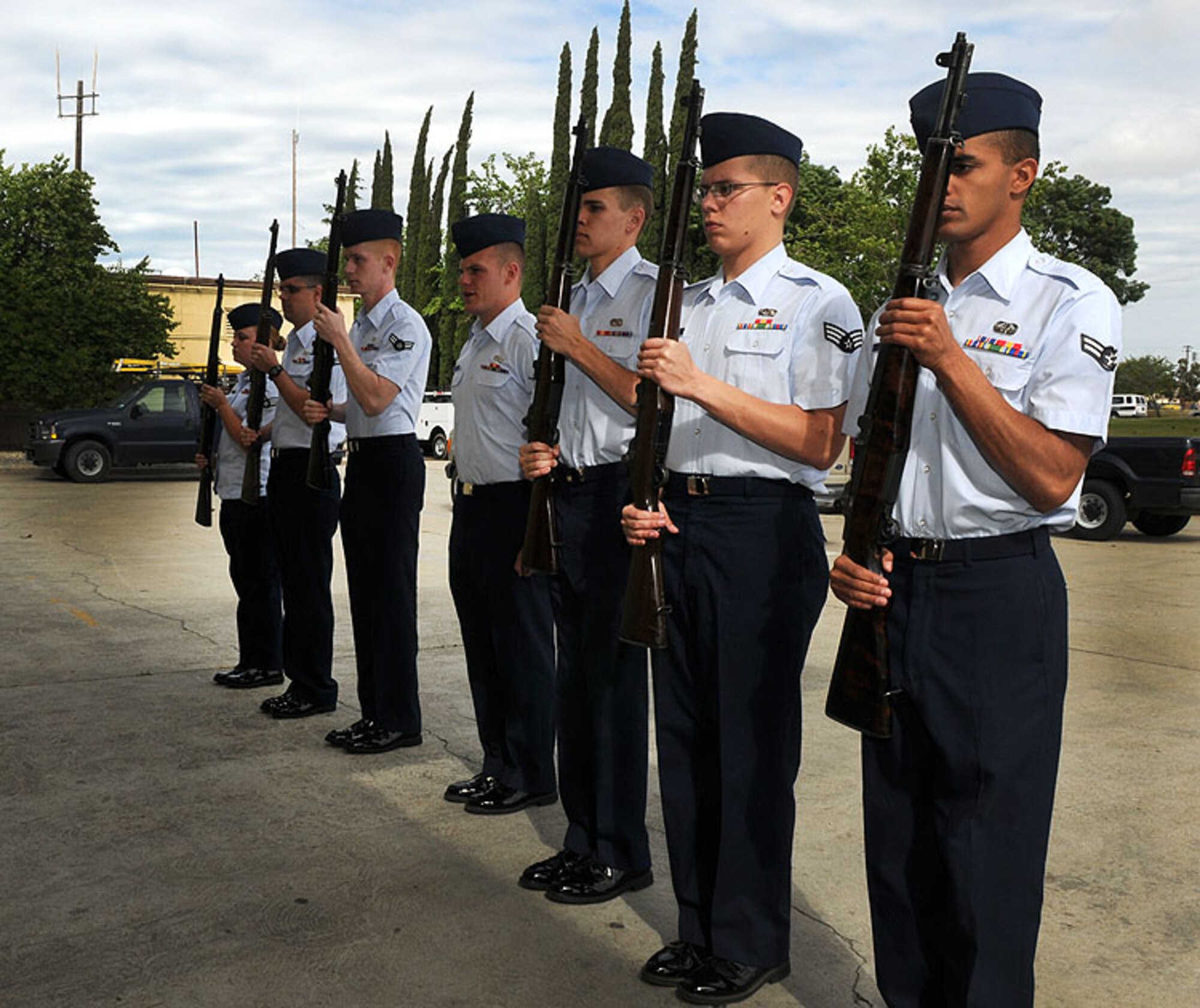 The Beale drill team practices a new routine May 24 outside building 1086. The drill team has been practicing vairous drills and learning new moves for about one month. (U.S. Air Force photo by Airman 1st Class David Tracy)