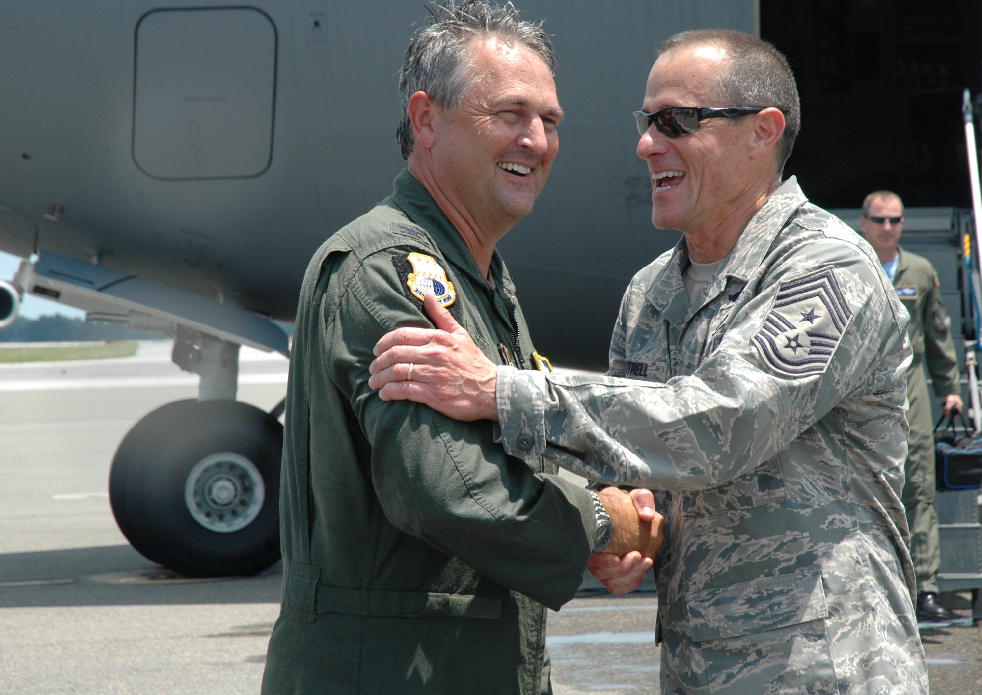 Colonel Mike Speer is greated by Chief Ben Futrell as he finishes his Fini Flight on Friday, May 21.  Colonel Speer has been in the Air Force for 26 years and has  been part of Charleston Air Force Base since 1991.  Colonel Speer offically retires as a Colonel on 1 June 2010.