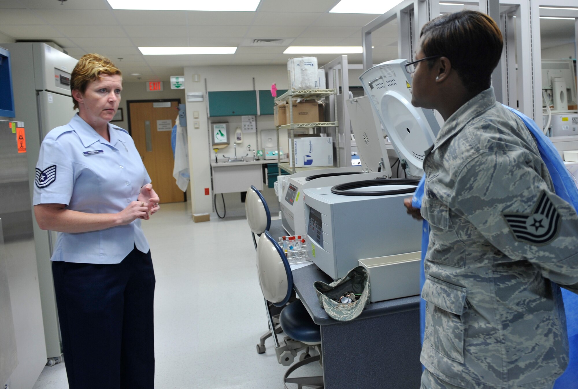 MOODY AIR FORCE BASE, Ga. -- Tech Sgt. Monica Johnson, 74th Fighter Squadron independent duty medical technician, receives a safety briefing from Tech. Sgt. Angelita Pfeiffer, 23rd Medical Group NCO in-charge laboratory operations, prior to training here May 10. (U.S. Air Force photo by Staff Sgt. Schelli Jones/RELEASED)