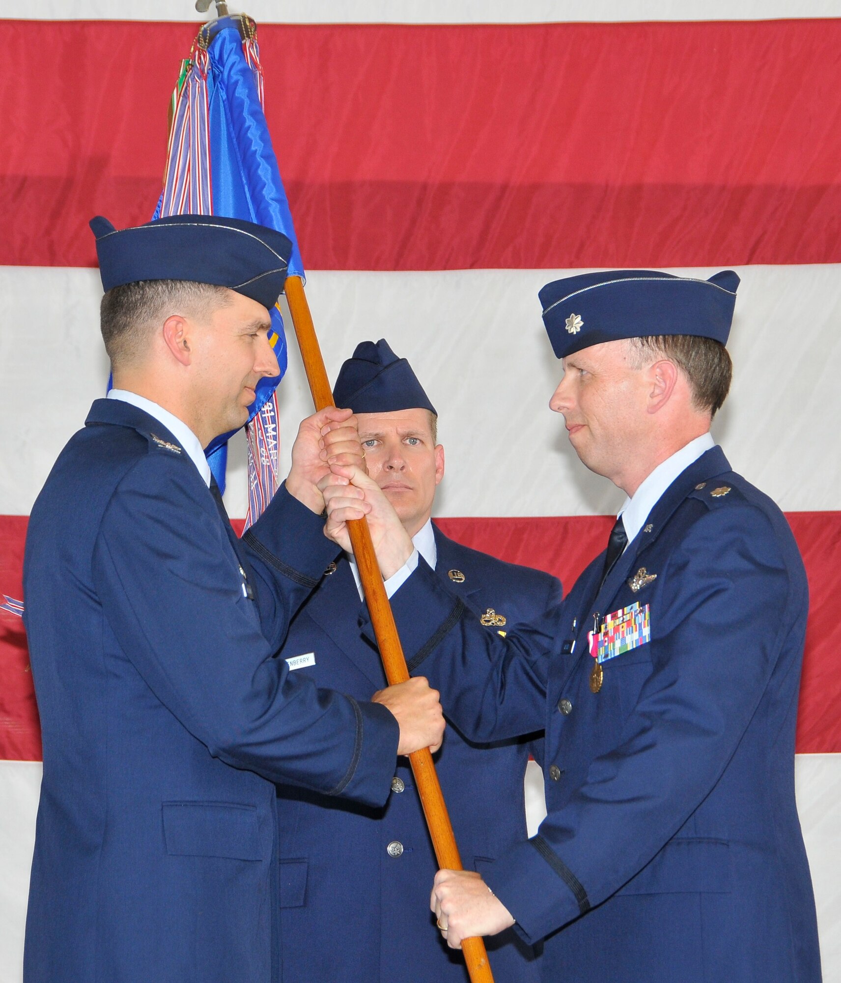 Lt. Col. Charles Mayer relinquished command of the 325th Air Control Squadron to Lt. Col. Robert Grazulis during a change of command ceremony May 21 in Hangar 2.  Colonel Grazulis was the former 325th ACS director of operations before taking command.  (U.S. Air Force photo by Lisa Norman)
