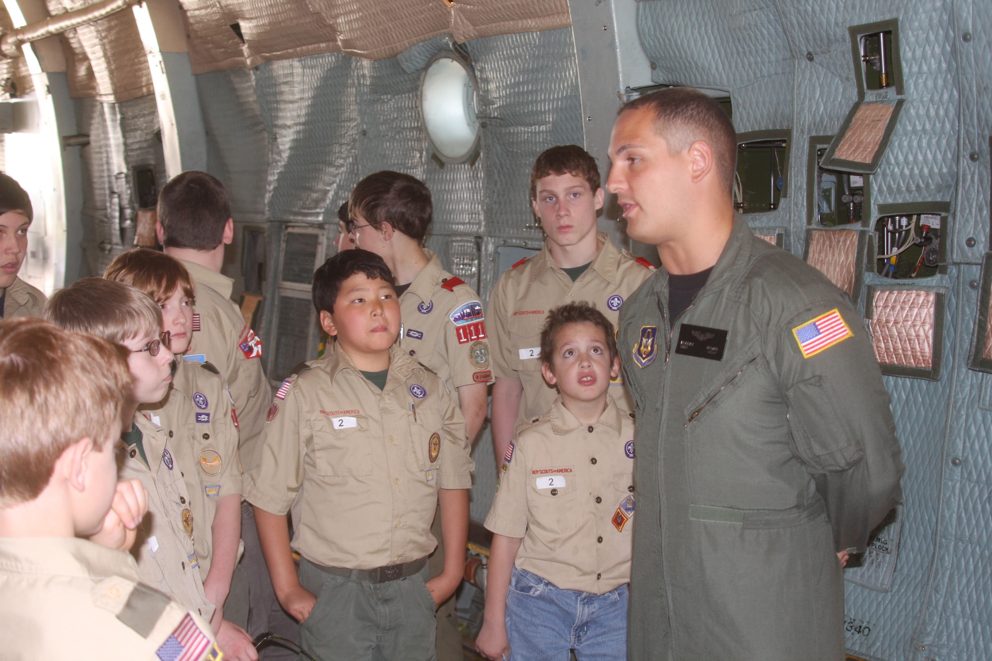 WRIGHT-PATTERSON AIR FORCE BASE, Ohio – Staff Sgt. Robert Rains, 89th Airlift Squadron, loadmaster, is showing Boy Scouts the mechanics of a C-5 Galaxy aircraft. More than 400 Boy and Girl Scouts from Ohio, Kentucky and Michigan, attended the 445th Airlift Wing’s first Scout Day May 15. (U.S. Air Force photo/Senior Airman Mikhail Berlin) 