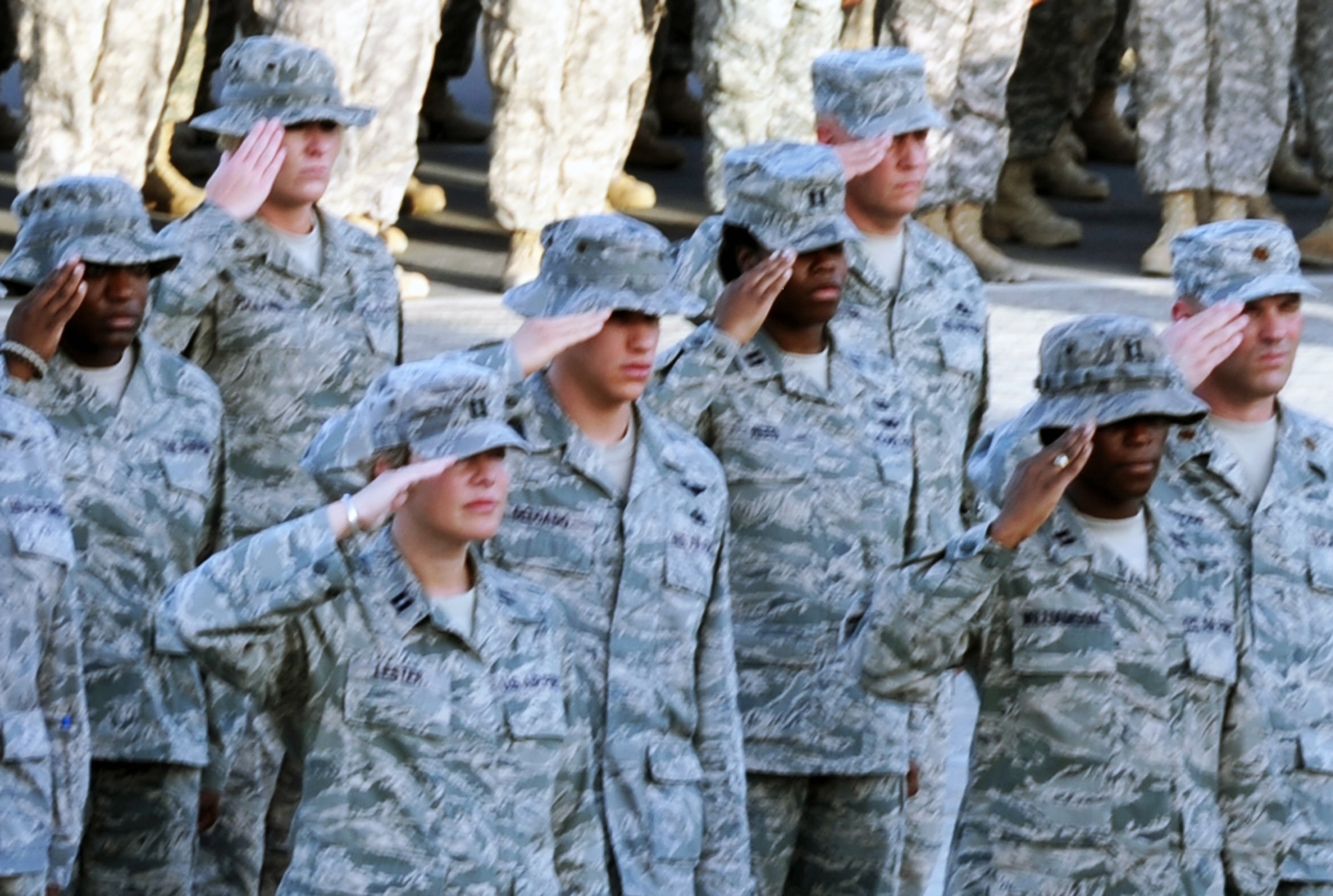 Airmen participate in a retreat ceremony May 21, 2010, at a non-disclosed base in Southwest Asia. The 380th Air Expeditionary Wing staff served as the lead unit in formation for the ceremony. Every week, the 380th AEW holds a retreat ceremony to honor the American flag and what it stands for. The 380th AEW supports operations Iraqi Freedom and Enduring Freedom and the Combined Joint Task Force-Horn of Africa. (U.S. Air Force Photo/Master Sgt. Scott T. Sturkol/Released)