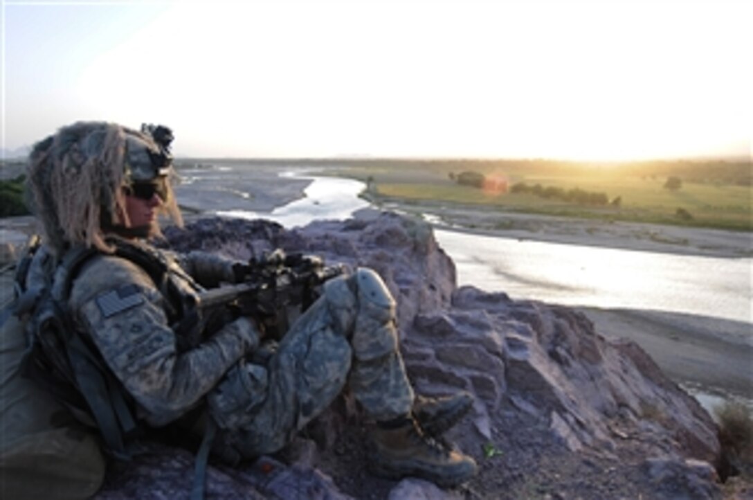 U.S. Army Pfc. Taylor Krinner, from Delta Company, 2nd Battalion, 508th Parachute Infantry Regiment, 4th Brigade Combat Team, 82nd Airborne Division, secures a perimeter in Sarde Sofla, Afghanistan, during a reconnaissance mission on May 7, 2010.  