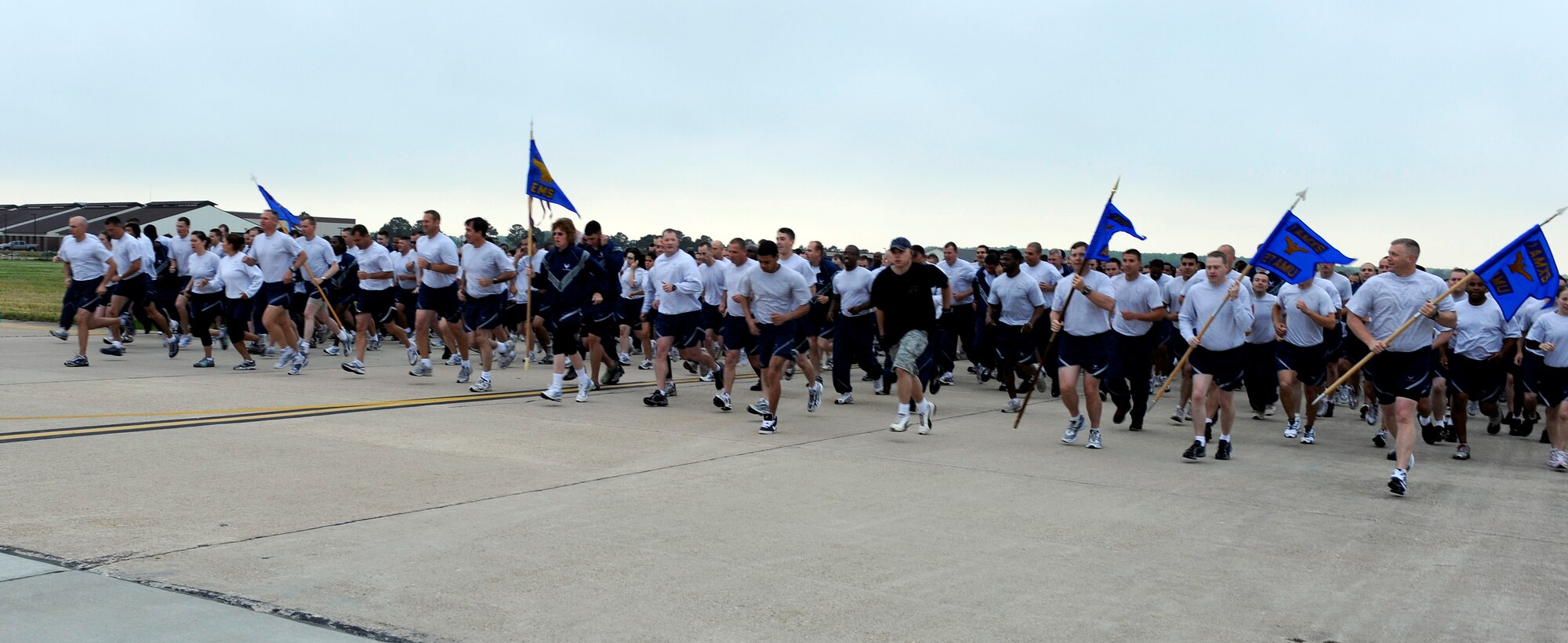 LANGLEY AIR FORCE BASE, Va. -- Members of Team Langley take off from the starting line during the Wingman Day fun run May 14. The 1.5-mile run on the flightline kicked off the day of events, filled with a variety of activities focusing on safety, alcohol and suicide awareness. (U.S. Air Force photo/Airman 1st Class Gul Crockett)