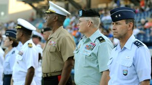 LANGLEY AIR FORCE BASE, Va. -- Maj. Gen. David Edgington, U.S. Joint Forces Command chief of staff, and other senior military representatives are recognized on the field during the opening ceremony of the Norfolk Tides baseball club’s 15th annual Military Appreciation Night May 22. The Tides hosts the event each year to honor service members from all branches of the military. (U.S. Air Force photo/Airman 1st Class Gul Crockett)
