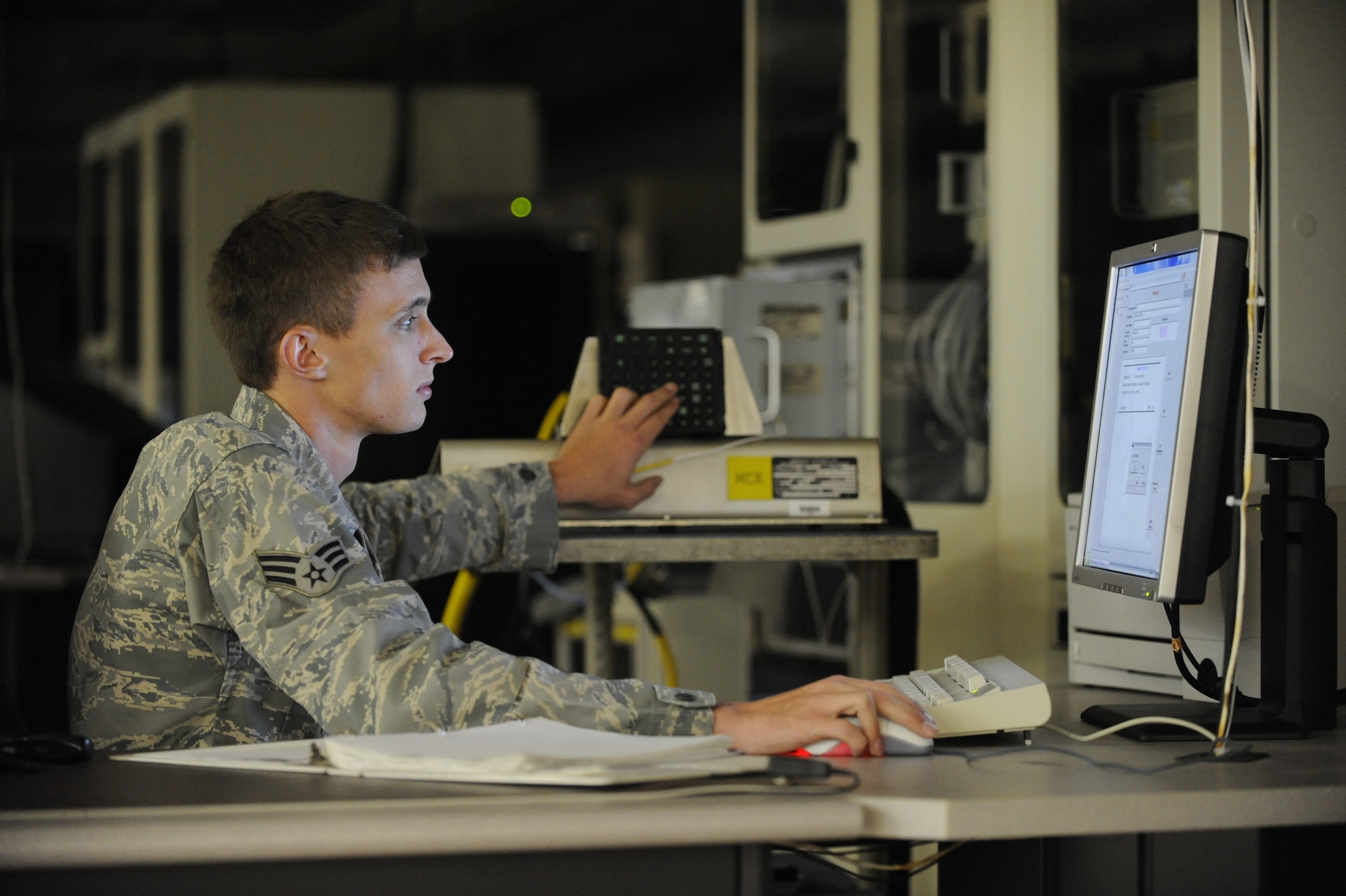 U.S. Air Force Senior Airman Daniel Teel tests a C-17 data entry keyboard May 25, 2010, at Joint Base Charleston, S.C. With only 20 percent of Air Mobility Command's C-17 avionics test equipment capabilities, the Avionics Shop in Charleston provides more than 50 percent of all avionics equipment repairs AMC-wide. Airman Teel is a test station and components journeyman with the 437th Maintenance Squadron  (U.S. Air Force photo/James M. Bowman)