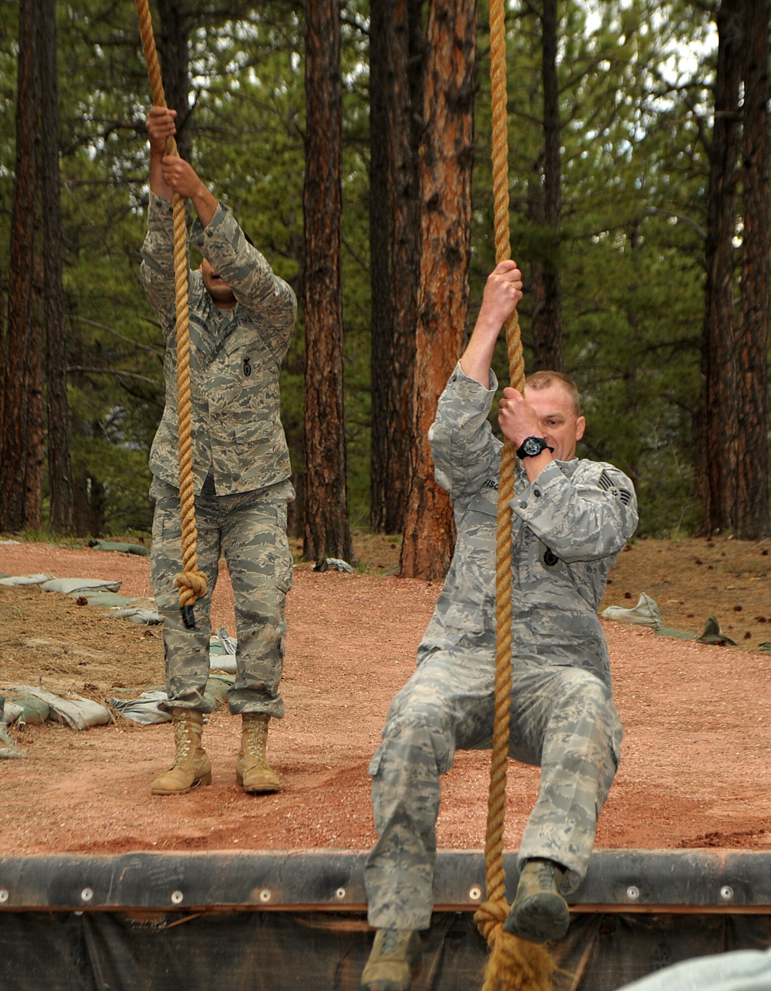 Staff Sgt. Randall Fischer, 137th Space Warning Squadron, navigates an obstacle during the security forces competition at Guardian Challenge May 19. (U.S. Air Force photo by Duncan Wood)