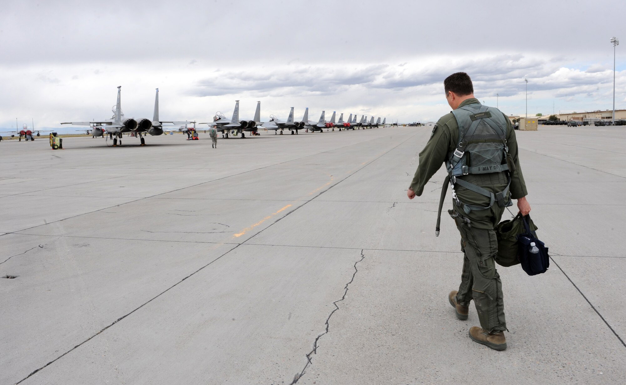 MOUNTAIN HOME AIR FORCE BASE, Idaho - Col. John Bird, former 366th Fighter Wing commander, walks onto the flight line towards an F-15E Strike Eagle before his final flight as commander, May 21. Colonel Bird has been selected to serve on the Joint Staff in Washington D.C. as the Chief of the Force Application Division at the Pentagon. (U.S. Air Force photo by Airman 1st Class Debbie Lockhart)