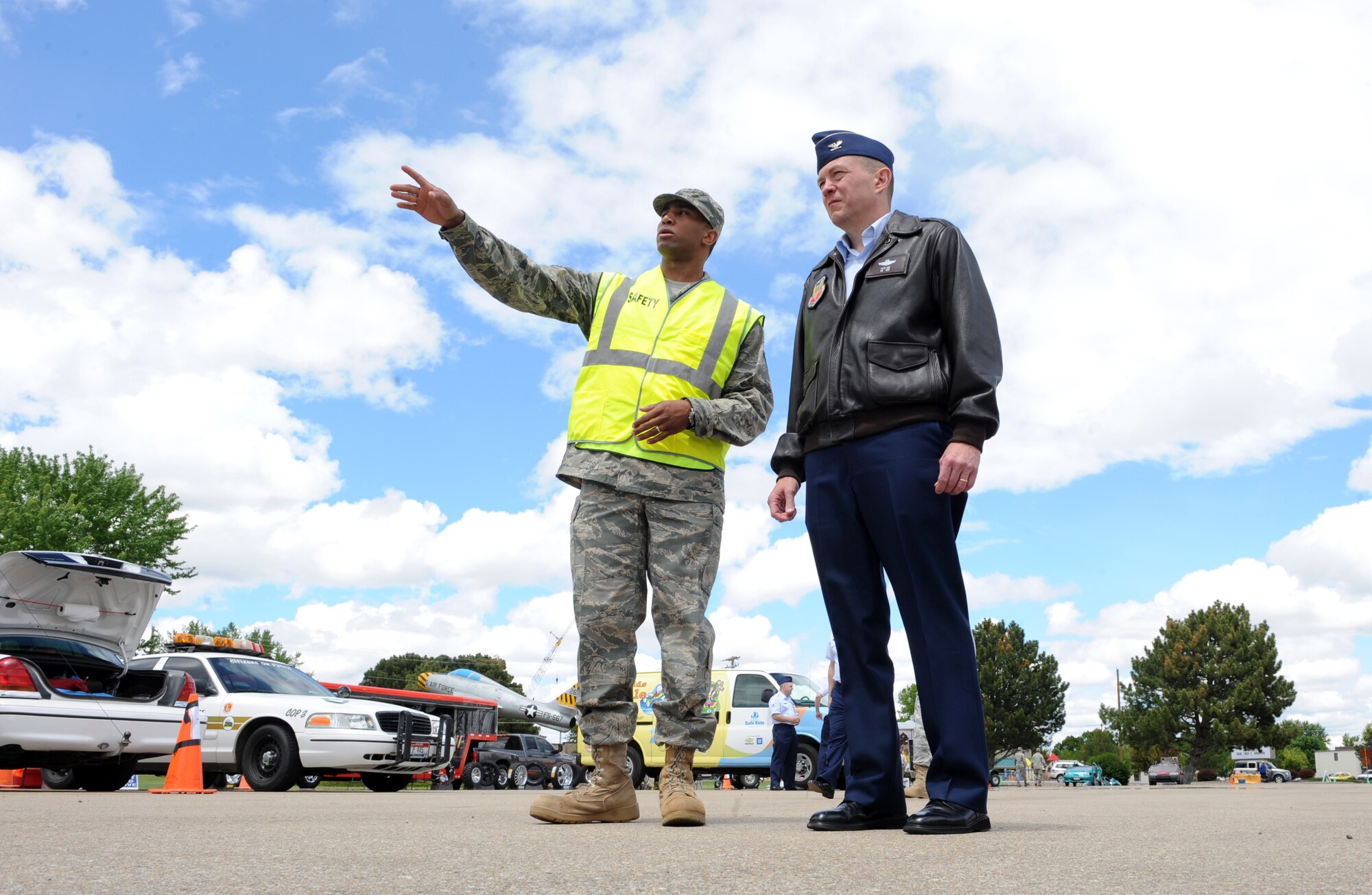 MOUNTAIN HOME AIR FORCE BASE, Idaho –Staff Sgt. Carlton Anthony, 366th Wing Safety, shows Col. Pete Lee, 366th Fighter Wing vice commander, displays and events during Wing Safety Day at Holt Park, May 24. The event included more than 20 local safety vendors, unit briefings and a safety brief at the base theater.  Activities at Holt Park included:  “Jaws of Life” vehicle extractions, child car seat checks, mock sobriety tests, golf cart driving with DUI goggles, Parks and Recreation/Fish and Game displays and many more. Wing Safety Day was intended to stress the importance of preventing mishaps while reviewing basic safety procedures to help decrease the risk of injury on and off duty. (U.S. Air Force photo by Airman 1st Class Debbie Lockhart)