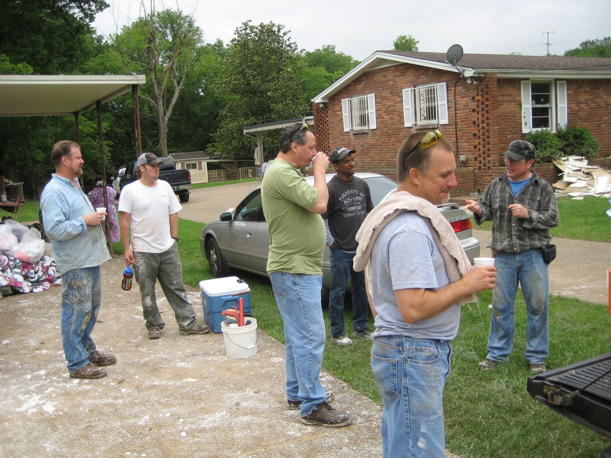 Aerospace Testing Alliance employees David Milleville, Larry O’Neal, Roy Thompson, Steve Brewer, Brent Morris and Fred Hutchinson spent a vacation day in Nashville, Tennessee cleaning up after the recent flooding.  (Photo by Fred Hutchinson)