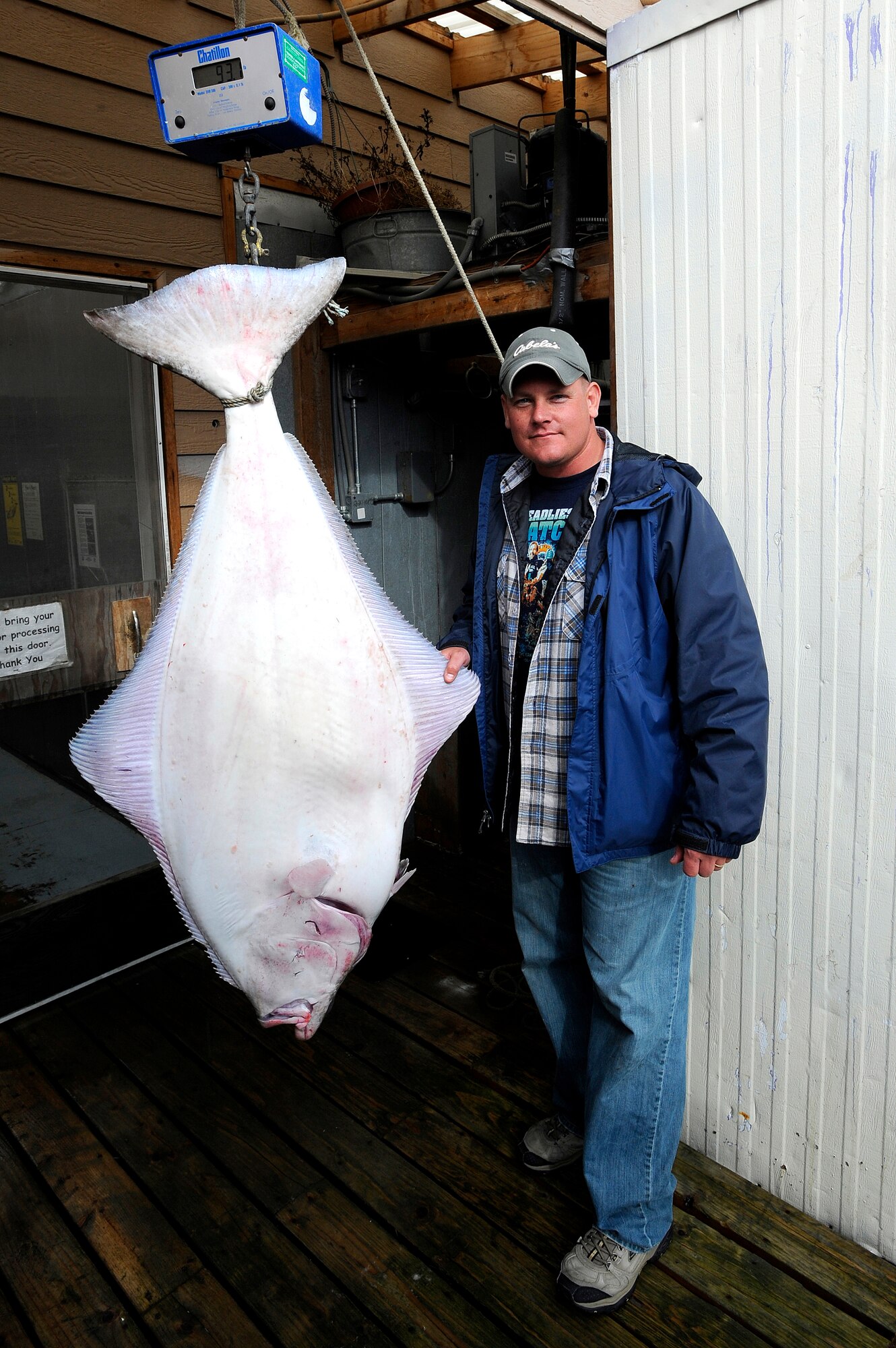 Master Sgt. Aaron Huber, 140th Calvary, Airborne, caught the biggest Halibut in Whittier, weighing in at 93.9 pounds, during the first Alaskan Veterans Halibut Fishing Tournament May 21.  The tournament took place in Homer, Valdez and Whittier, and is the communities' way of showing their appreciation to veterans.  Forty-two boats volunteered to take 264 veterans fishing in the three cities. A $500 grand prize was given to the participant who caught the biggest fish between the three cities, and a $250 prize was given to the participant who caught the biggest fish in each city.  (U.S. Air Force photo/Staff Sgt. Brian Ferguson)