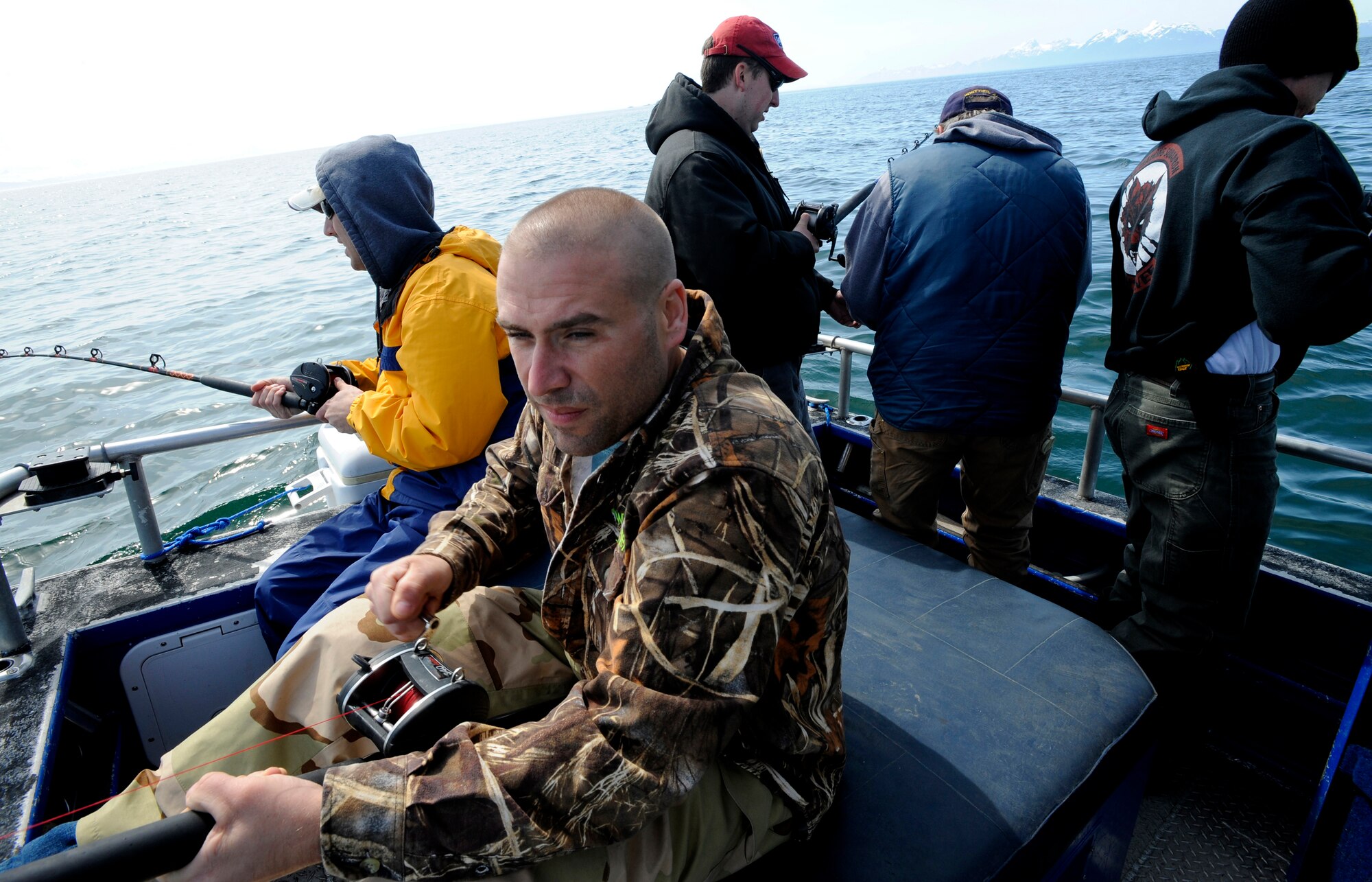 Airmen from Elmendorf Air Force Base take part in the first Alaskan Veterans Halibut Fishing Tournament May 21.  The tournament took place in Homer, Valdez and Whittier, and is the communities' way of showing their appreciation to veterans.  Forty-two boats volunteered to take 264 veterans fishing in the three cities. A $500 grand prize was given to the participant who caught the biggest fish between the three cities, and a $250 prize was given to the participant who caught the biggest fish in each city.  (U.S. Air Force photo/Staff Sgt. Brian Ferguson)