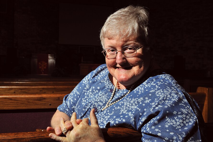 Ann Lukens poses for a photo at the Moody base chapel here May 24.  Mrs. Lukens, a faith-driven woman who believes nothing happens by chance is Moody’s 23rd Force Support Squadron school liaison officer.