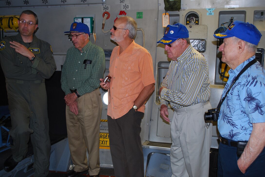 Members of the 315th Troop Carrier Group Association received a briefing aboard the C-17 Globmaster III by Master Sgt. Drew Cheek a loadmaster with the 315th Airlift Wing, Charleston Air Force Base, S.C. May 21 here. MSgt. Cheek and other reservist at Charleston can trace their roots back to the 315 TCG. (U.S. Air Force Photo/Staff Sgt. Darren S. Ellis)
