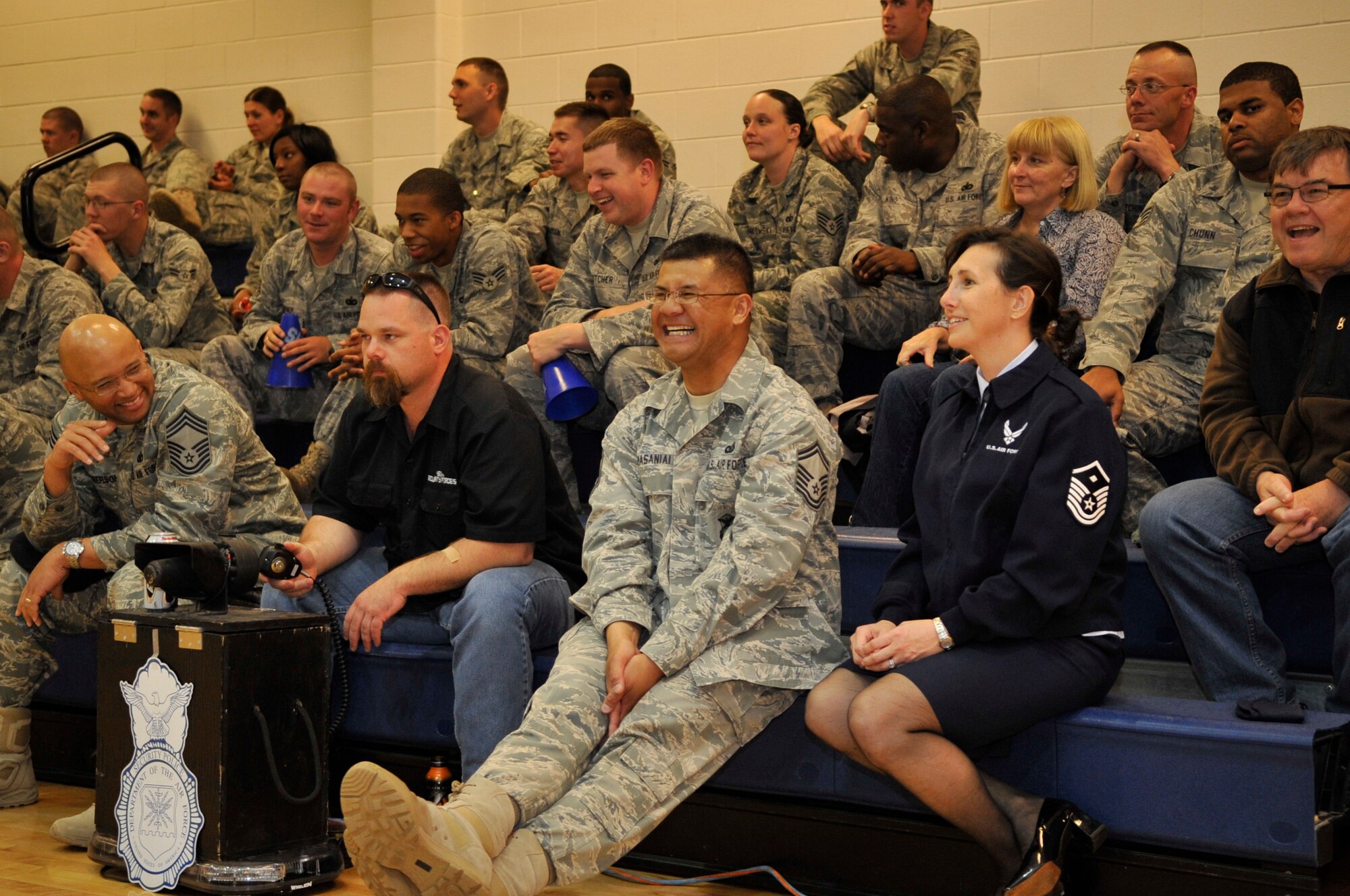 BUCKLEY AIR FORCE BASE, Colo. -- 460th Security Forces Squadron members enjoy the entertainment at the Buckley Guardian Challenge Pep Rally May 14. (U.S. Air Force photo by Airman 1st Class Paul Labbe)

