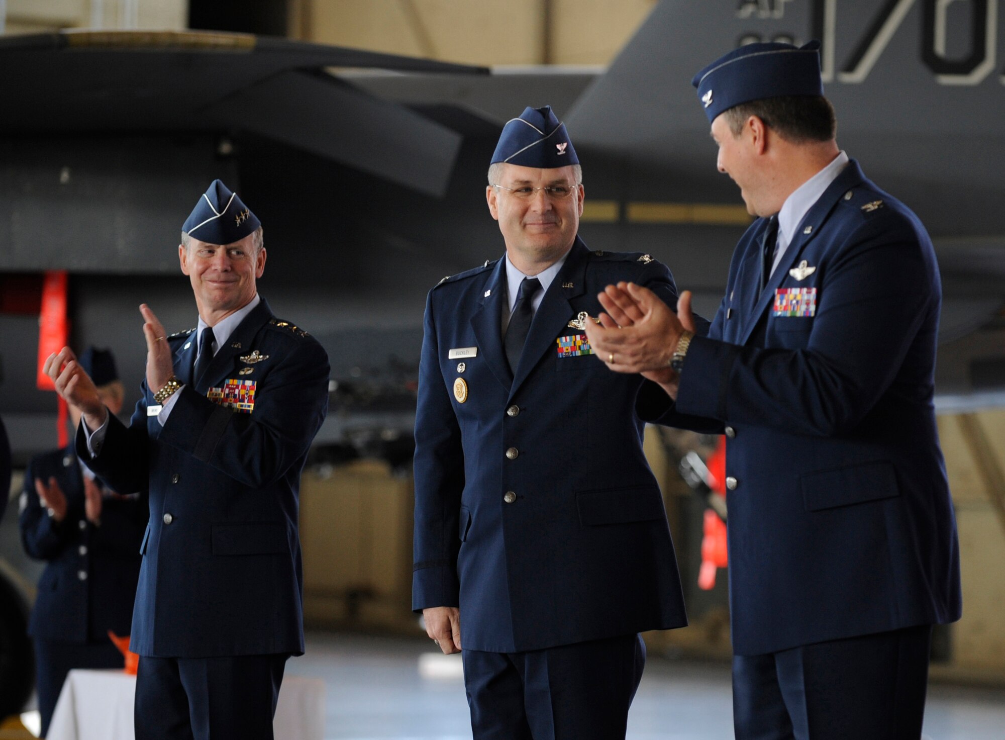 MOUNTAIN HOME AIR FORCE BASE, Idaho -- Col.  Ronald Buckley, incoming 366th Fighter Wing commander, receives applause during the wing's change of command ceremony held in Hanger 211 May 24. Col. Buckley came from the 12th Operations Group at Randolph Air Force Base, Texas. (U.S. Air Force photo by Airman 1st Class Renishia Richardson)