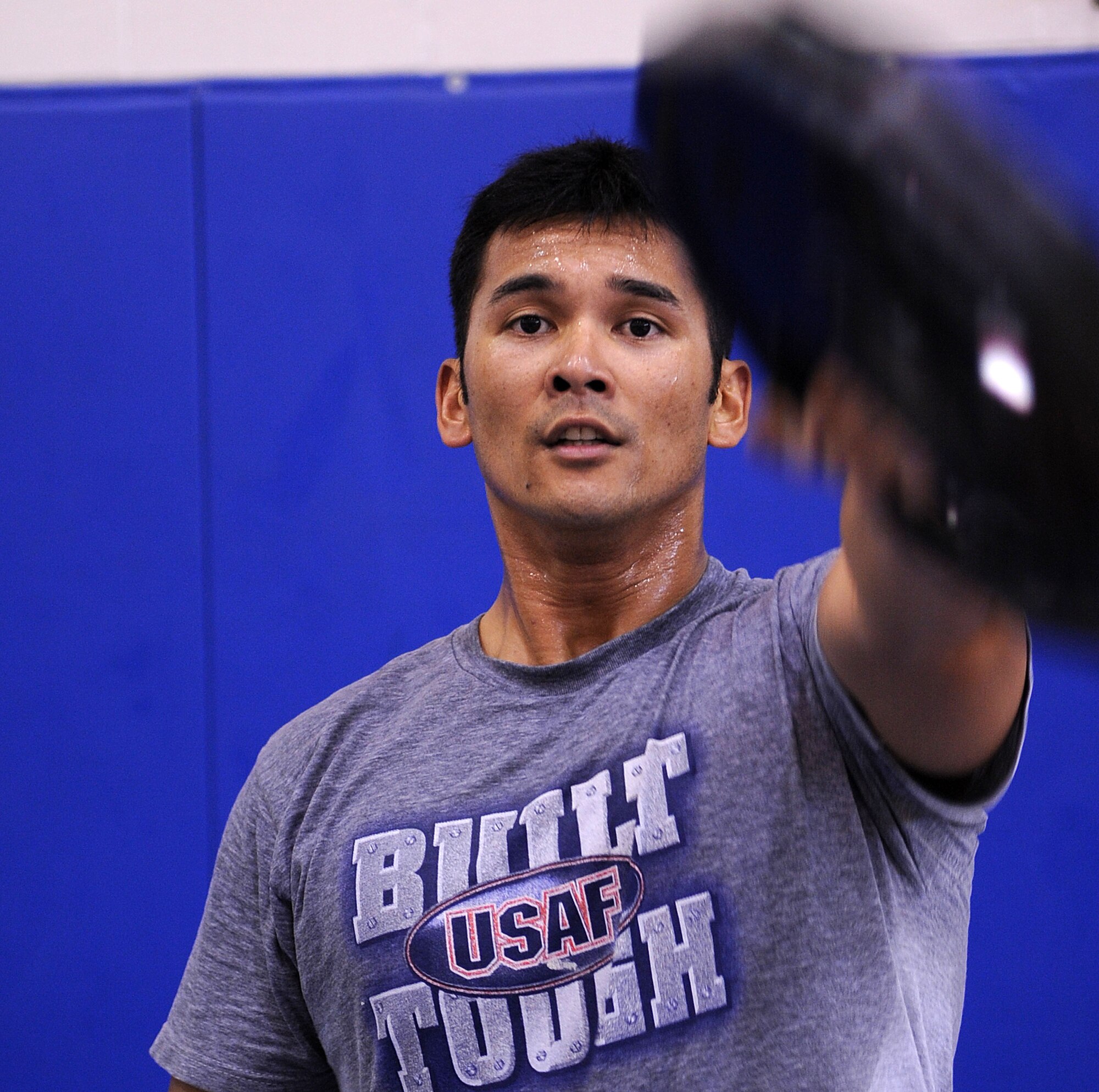 LANGLEY AIR FORCE BASE, Va. -- 2nd Lt. Jethro Sadorra, 633d Civil Engineer Squadron SABER officer in charge, participates in Prism Sports May 18.  Prism Sports is a high intensity workout designed to develop an athlete’s power, movement biomechanics, and strength while also reducing the likelihood of non-contact injury by teaching correct exercise technique, increasing lean body mass, gaining strength and flexibility, correcting postural deviations, and developing the body’s metabolic energy system.  (U.S. Air Force Photo/Staff Sgt. Christina M. Styer)